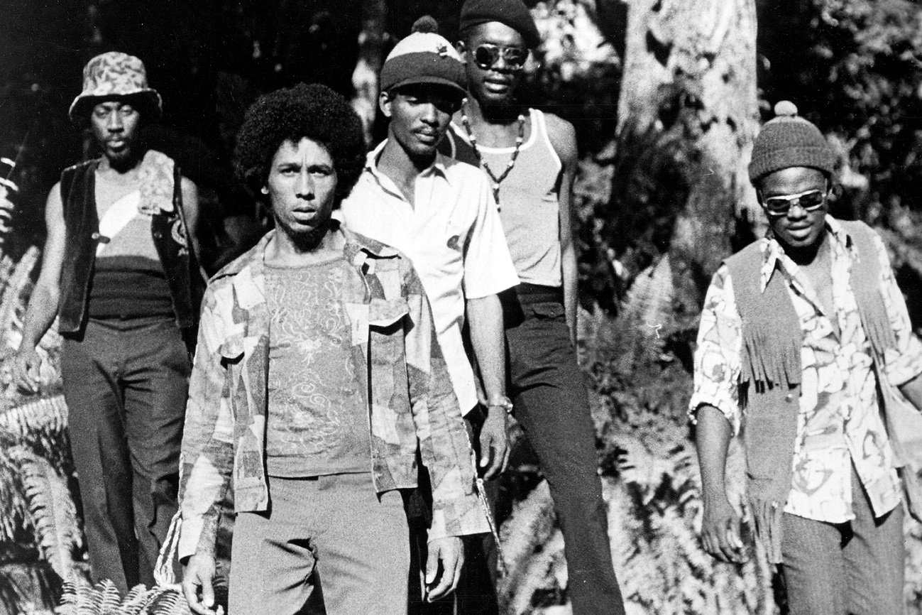 Photo of Bob Marley and The Wailers glaring at the camera circa 1971
