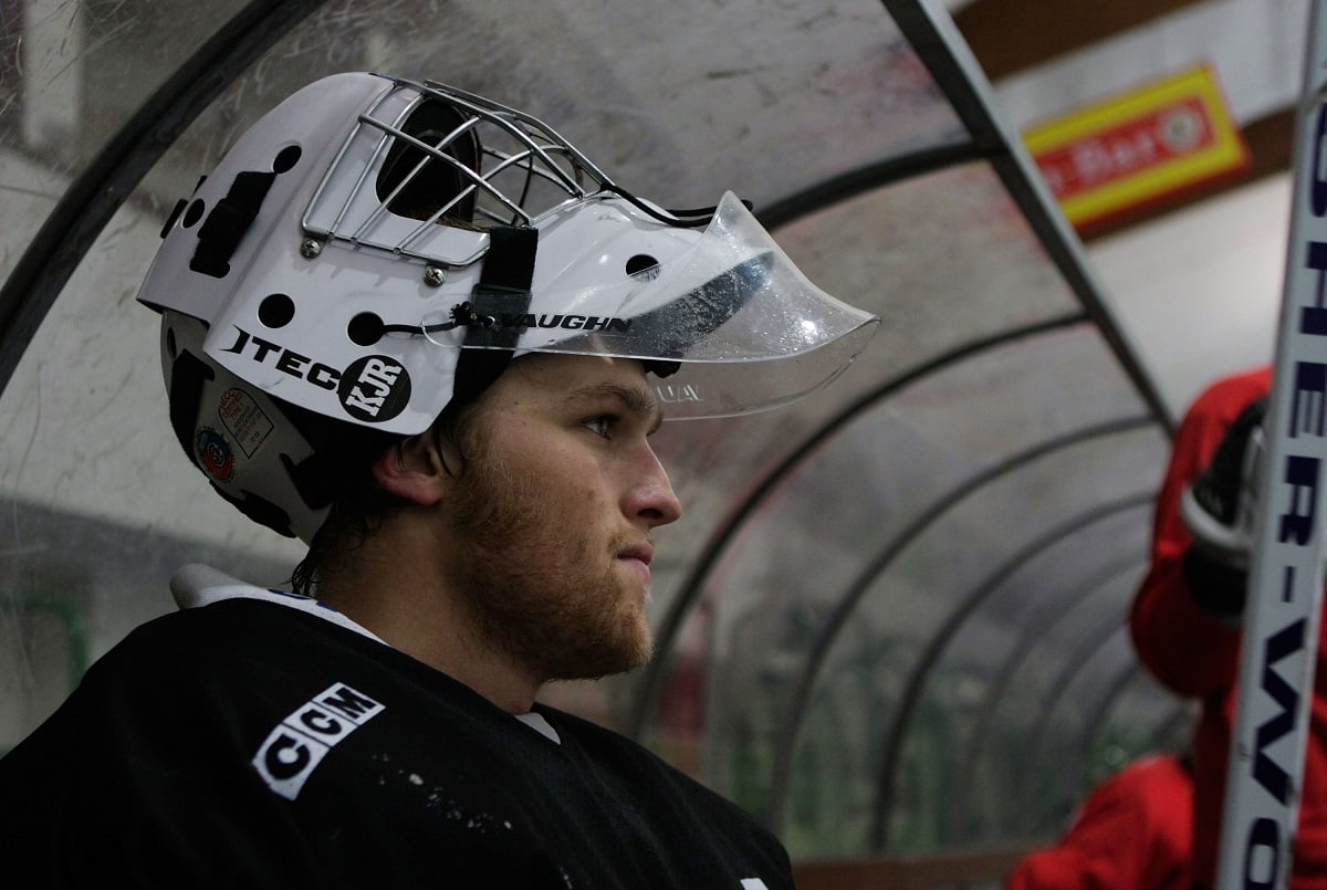 Wyatt Russell wearing a hockey helmet