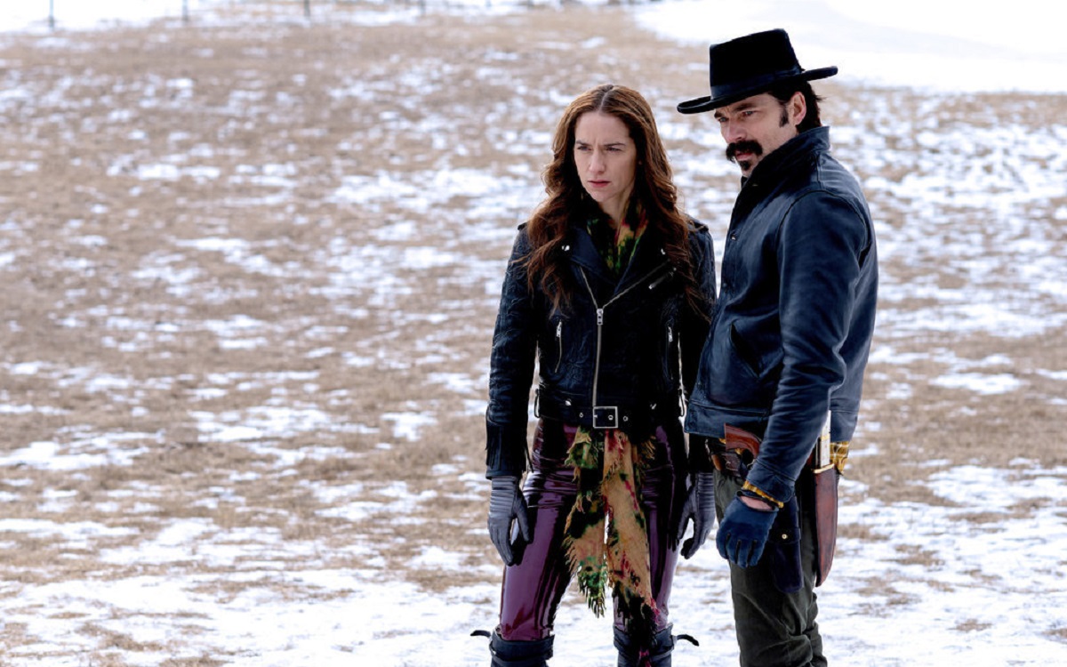 Wynonna Earp and Doc Holliday standing on snowy land in 'Wynonna Earp' Season 4