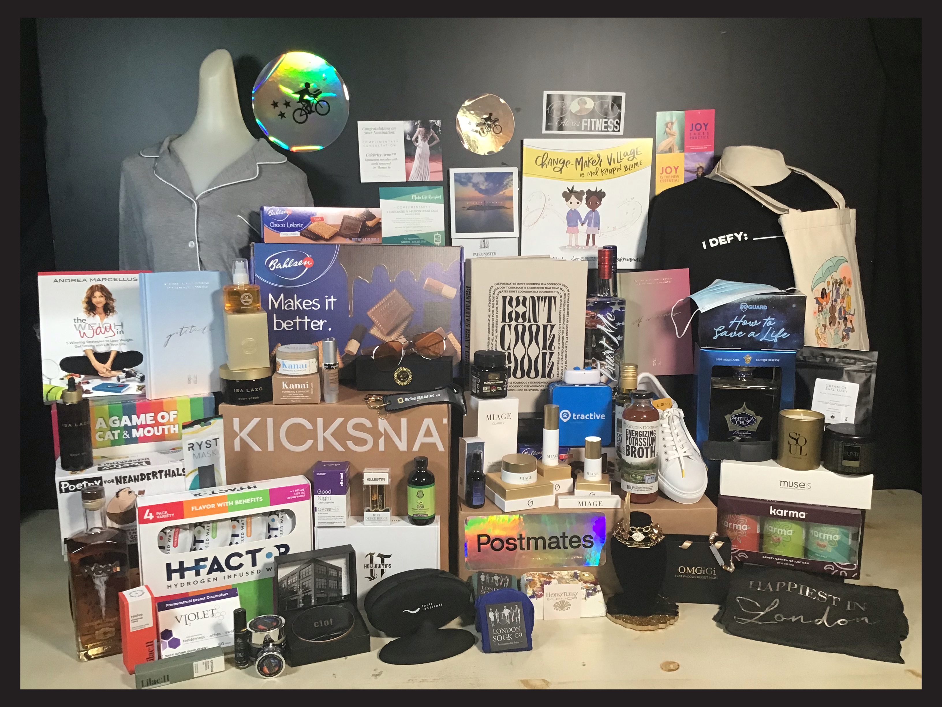 Contents of the 2021 Oscars gift bag displayed on a table
