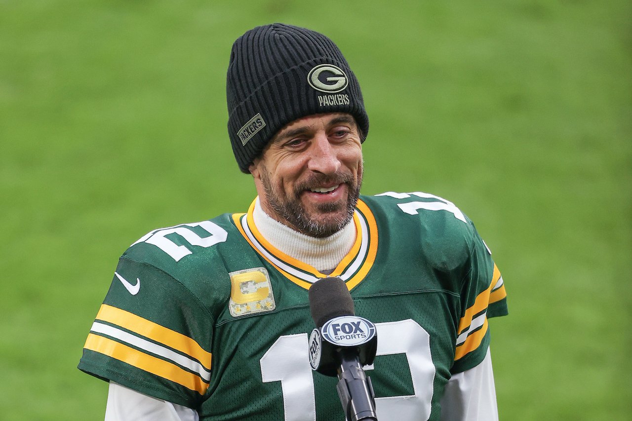 Aaron Rodgers #12 of the Green Bay Packers speaks to the media after beating the Jacksonville Jaguars 