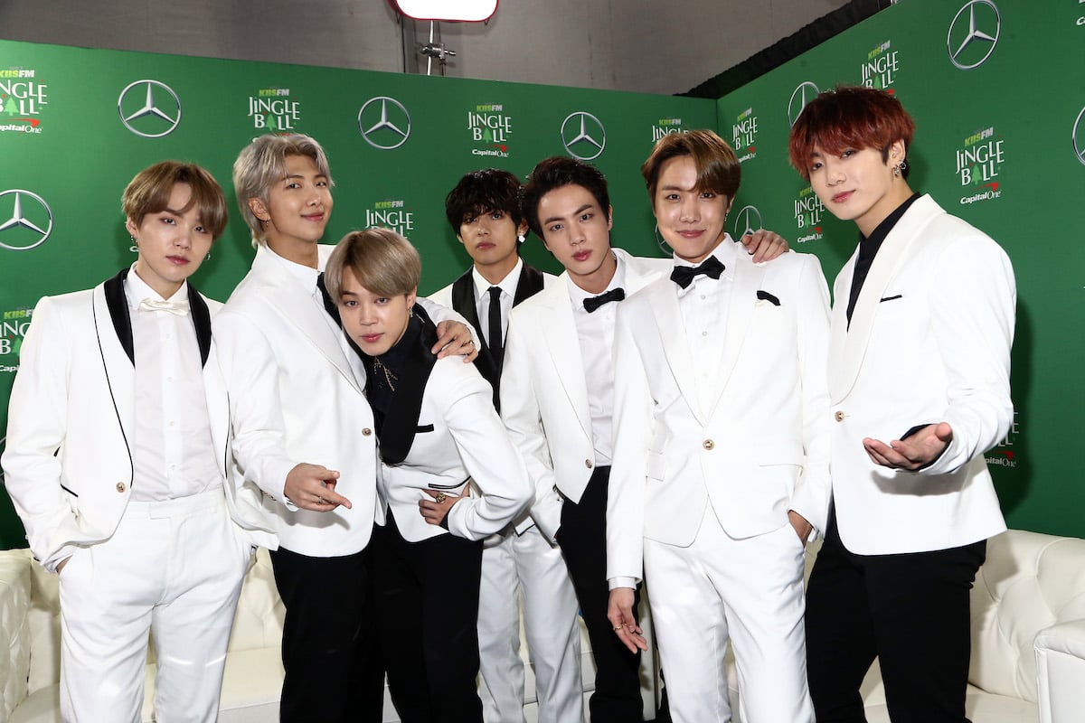 BTS dressed in white for the 2019 Jingle Ball
