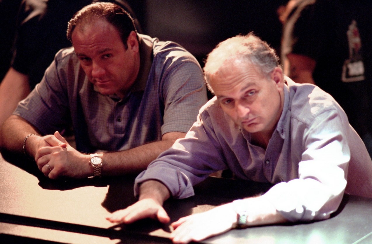 James Gandolfini and David Chase lean on a counter during a 'Sopranos' shoot