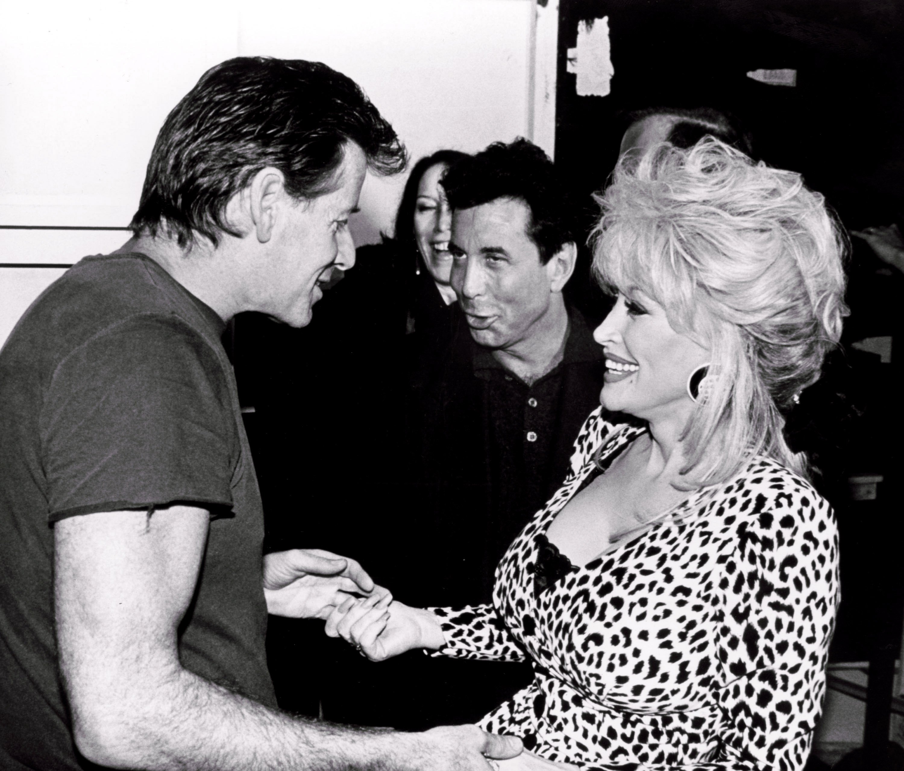 Calvin Klein and Dolly Parton at the 1994 Fall Collections Fashion Show held at Bryant Park in New York City, NY.