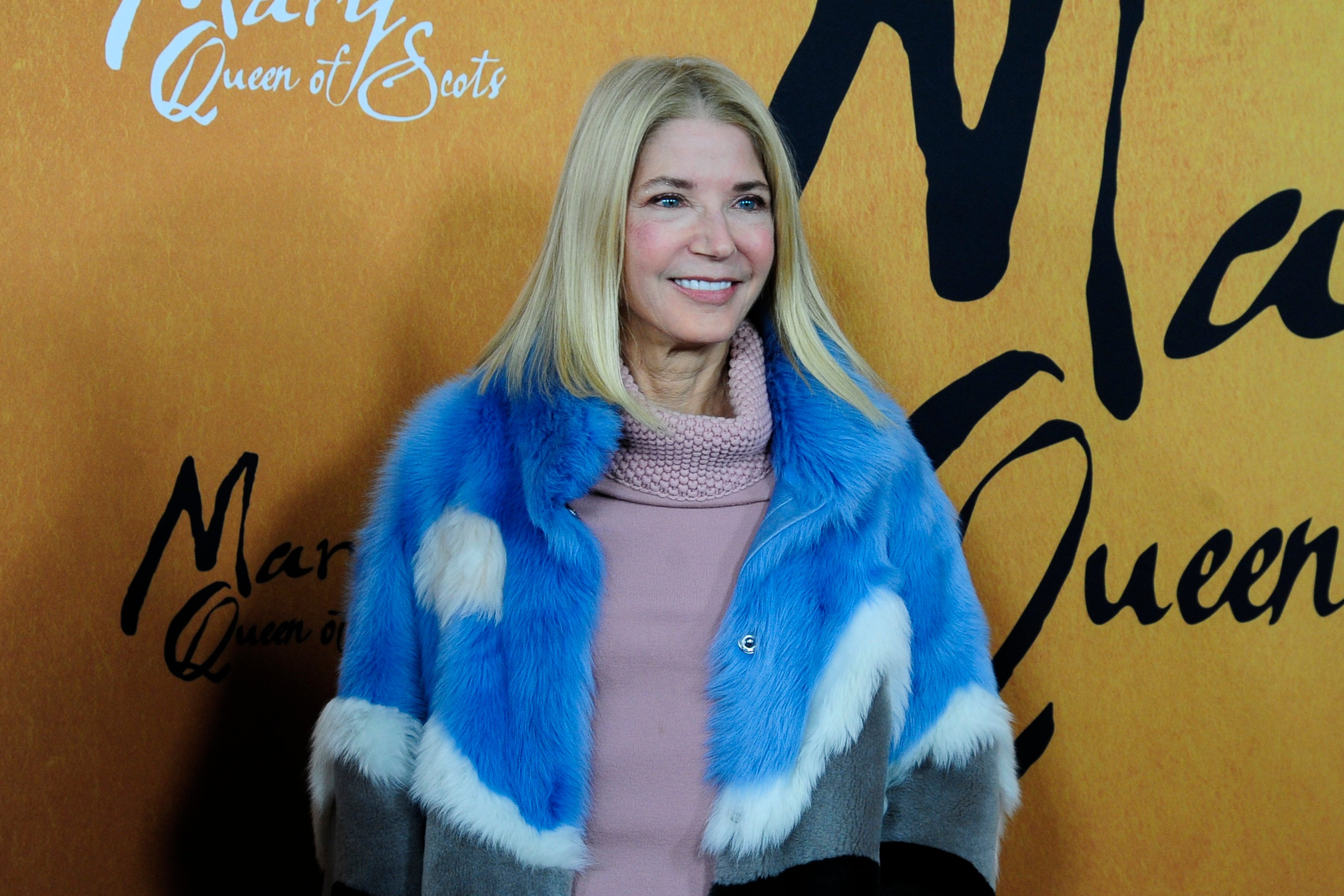 Candace Bushnell smiles for the cameras at the premire of "Focus Features Hosts The New York Premiere Of Mary Queen Of Scots"