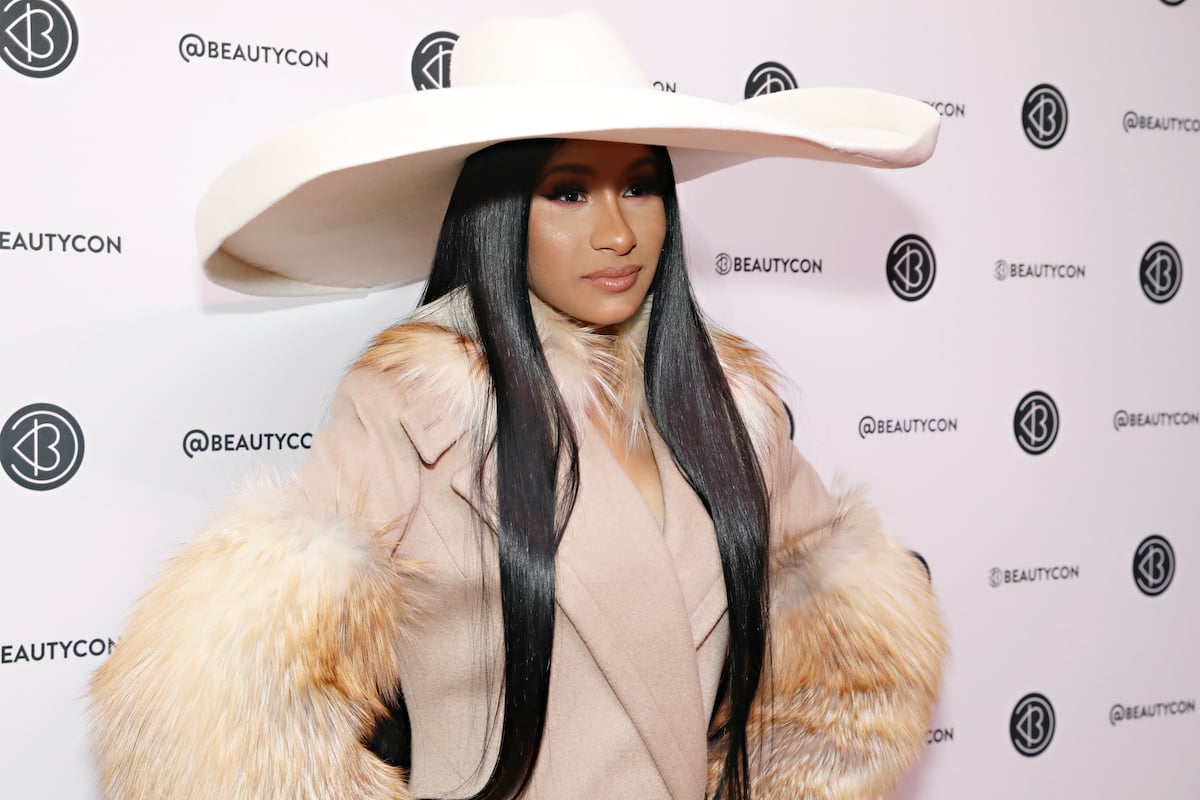 Cardi B in a massive wide brim hat