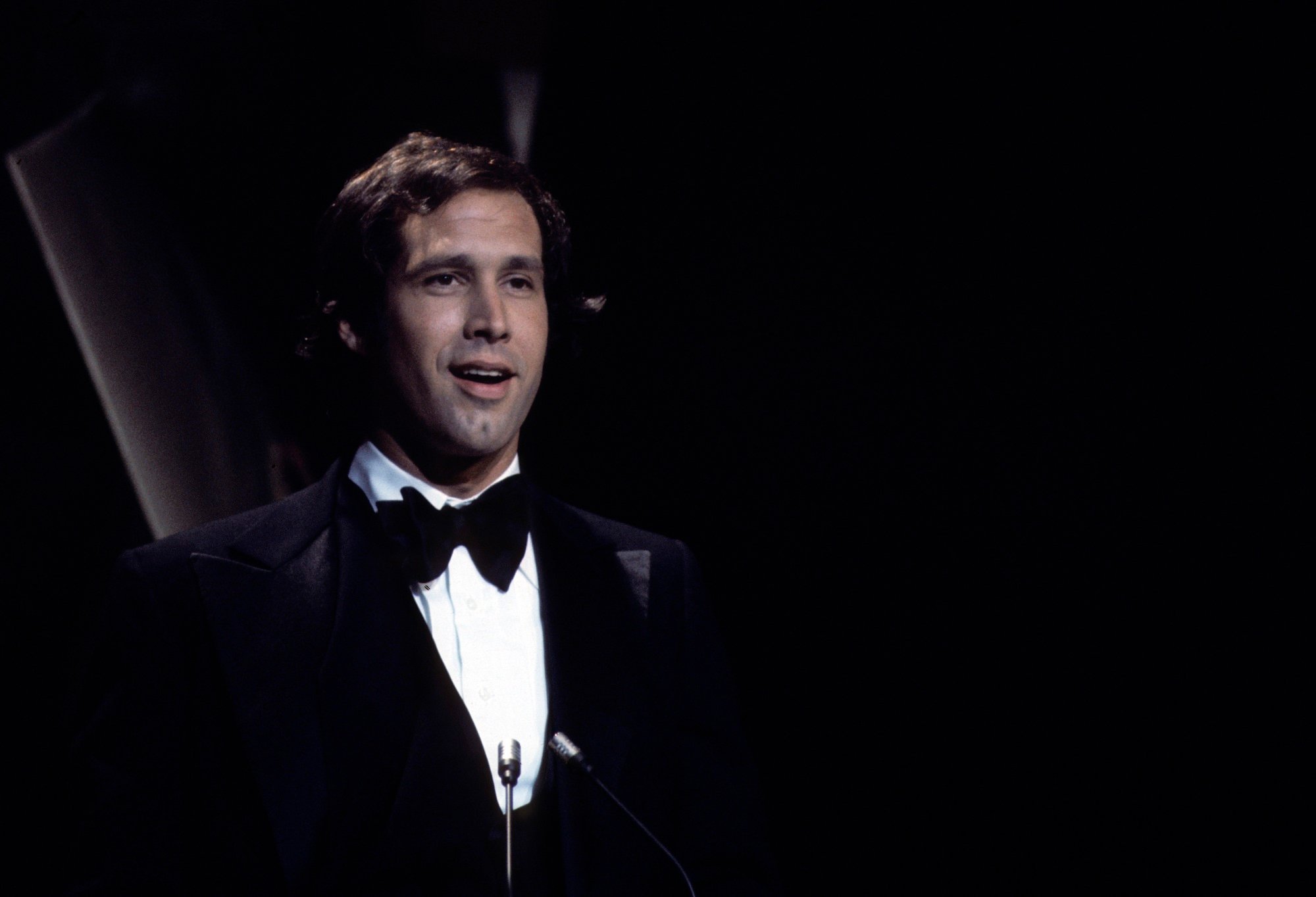 Chevy Chase wearing a tuxedo