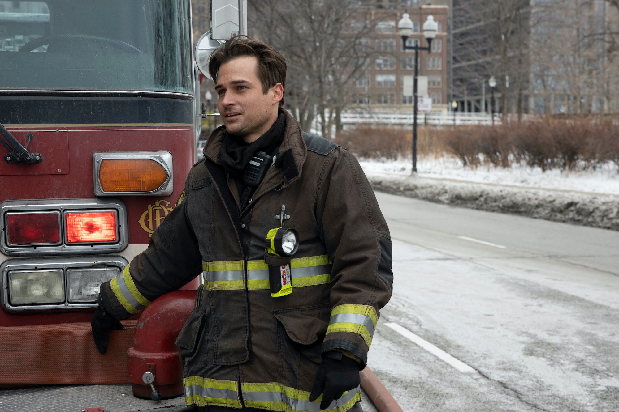 Jon-Michael Ecker in front of a fire truck