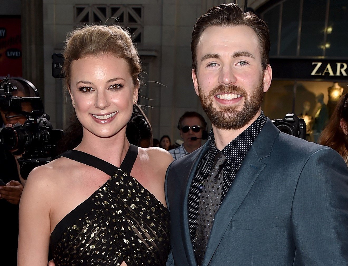 Actors Emily VanCamp and Chris Evans attend the premiere of 'Captain America: Civil War' in 2016