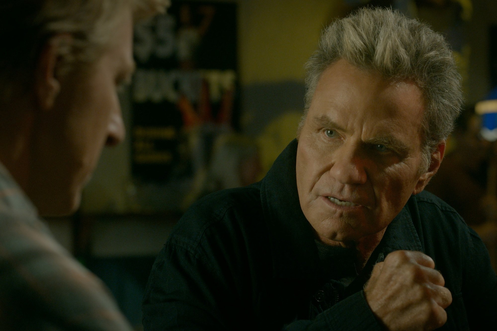 Cobra Kai stars Martin Kove makes a fist with William Zabka