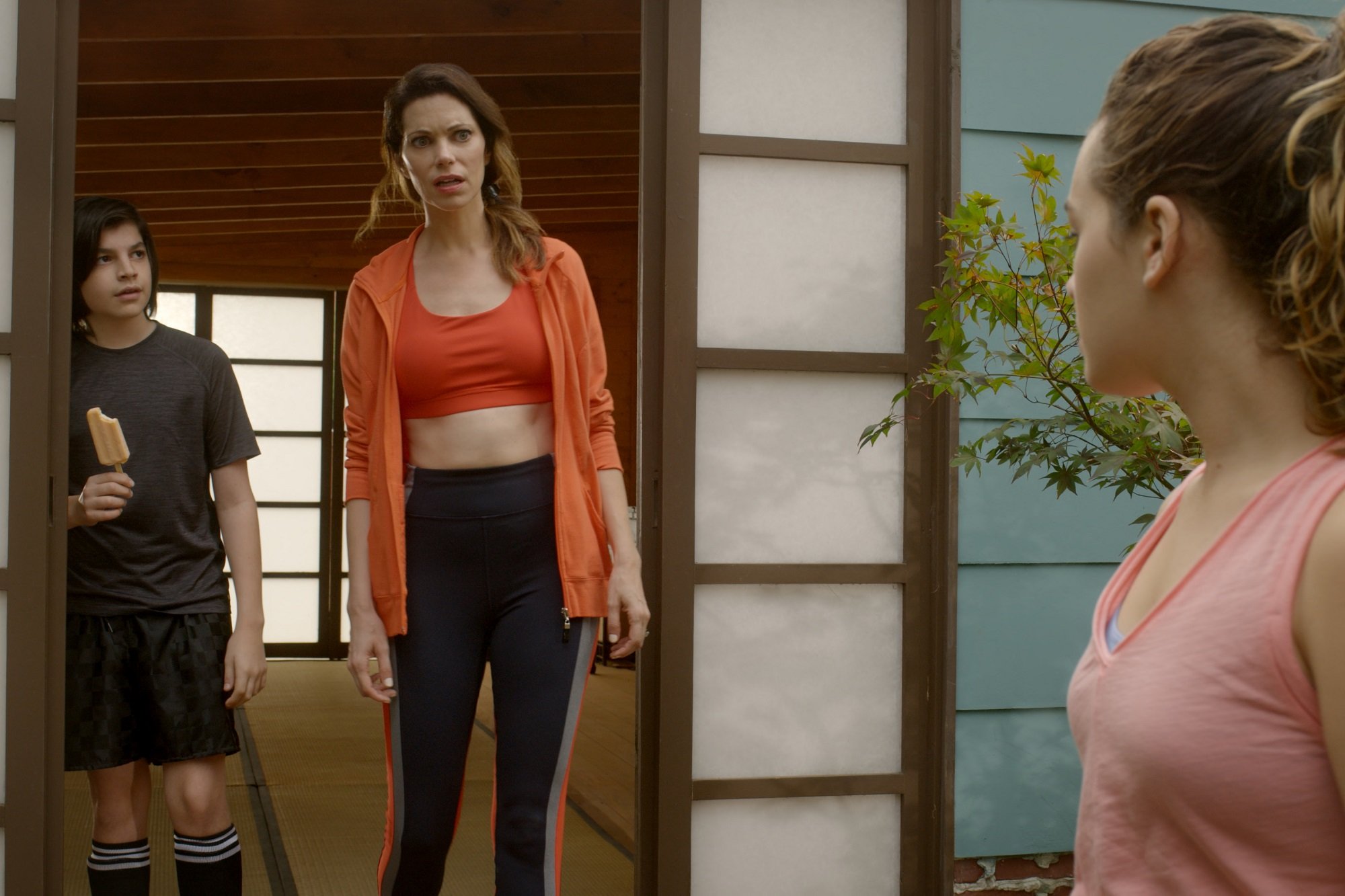 Cobra Kai star Courtney Henggeler in workout clothes with her kids