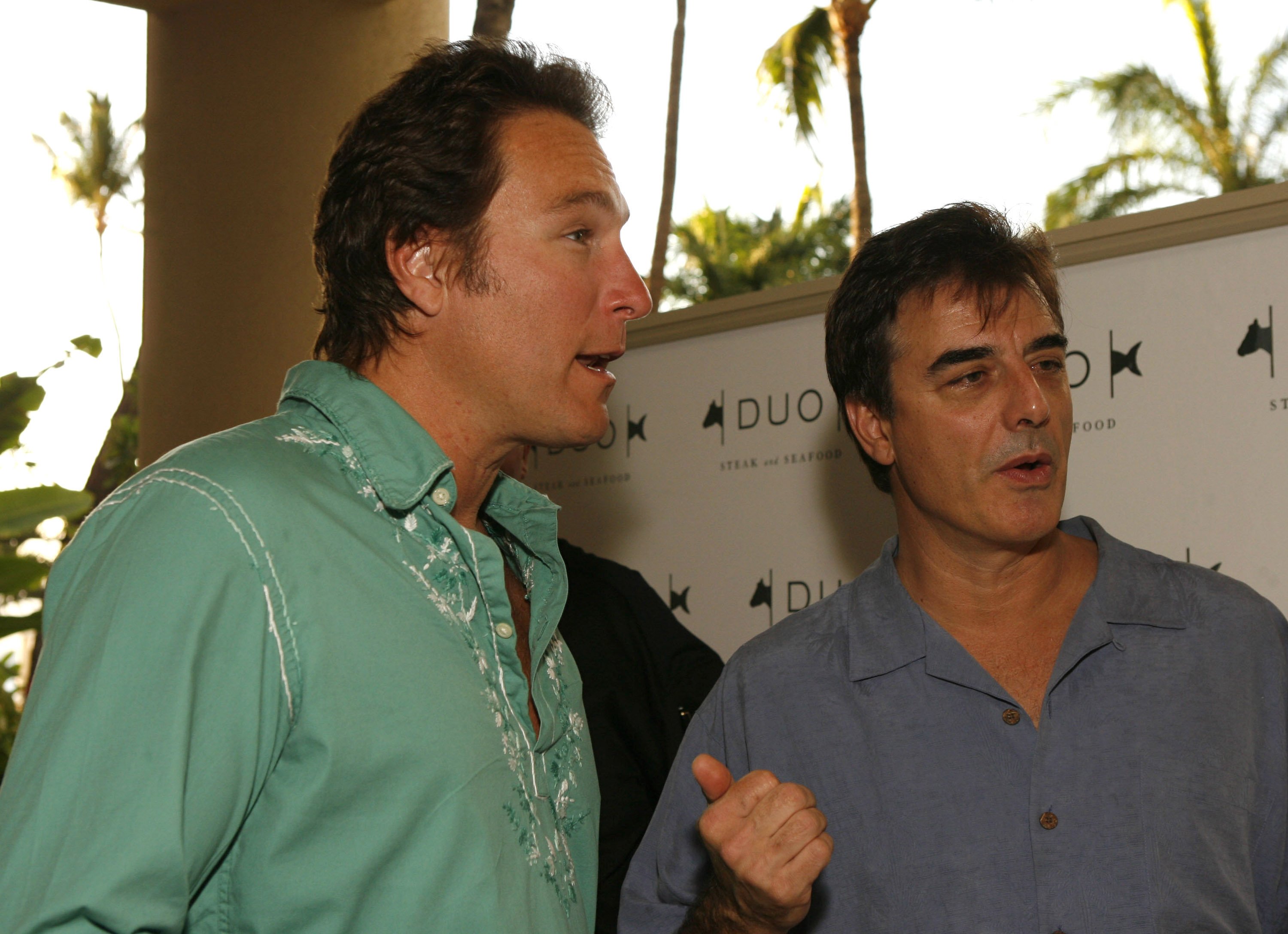 John Corbett and Chris Noth chat with a group at the Duo Grand Opening at the Four Seasons Maui