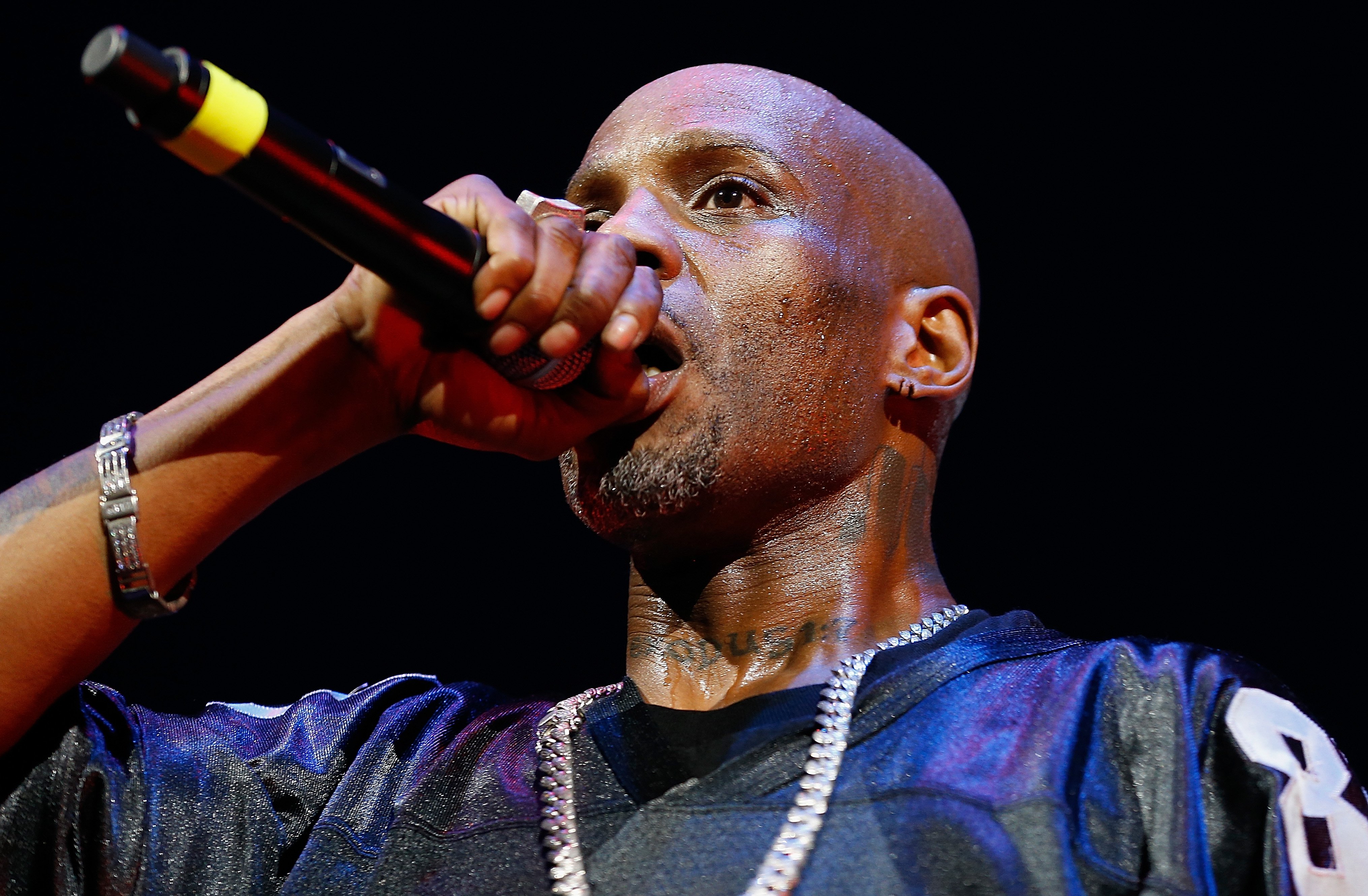 Rapper DMX rapping into a mic