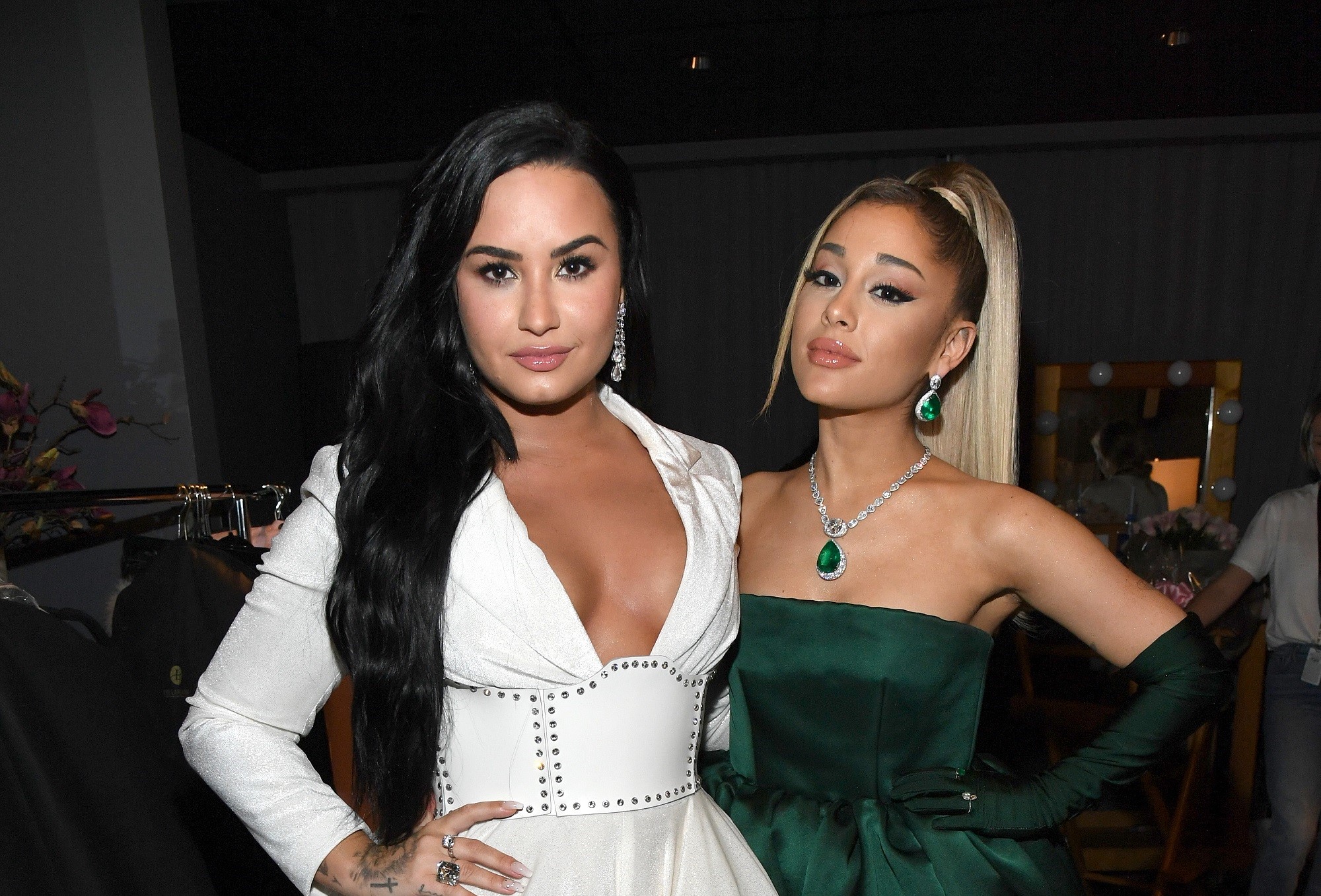 Demi Lovato and Ariana Grande pose together during the 62nd Annual GRAMMY Awards in January 2020