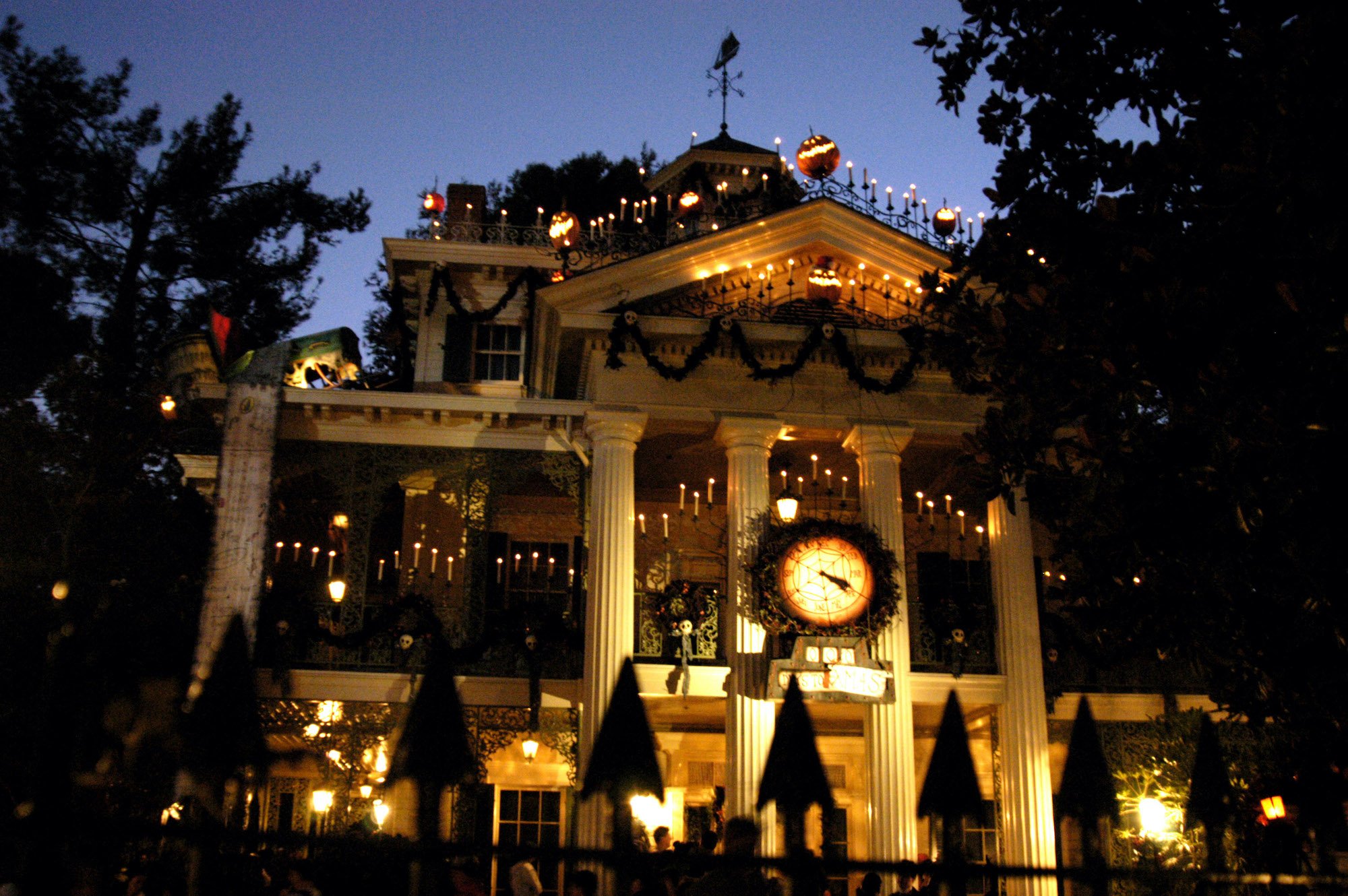Disneyland's haunted mansion decorated for Christmas