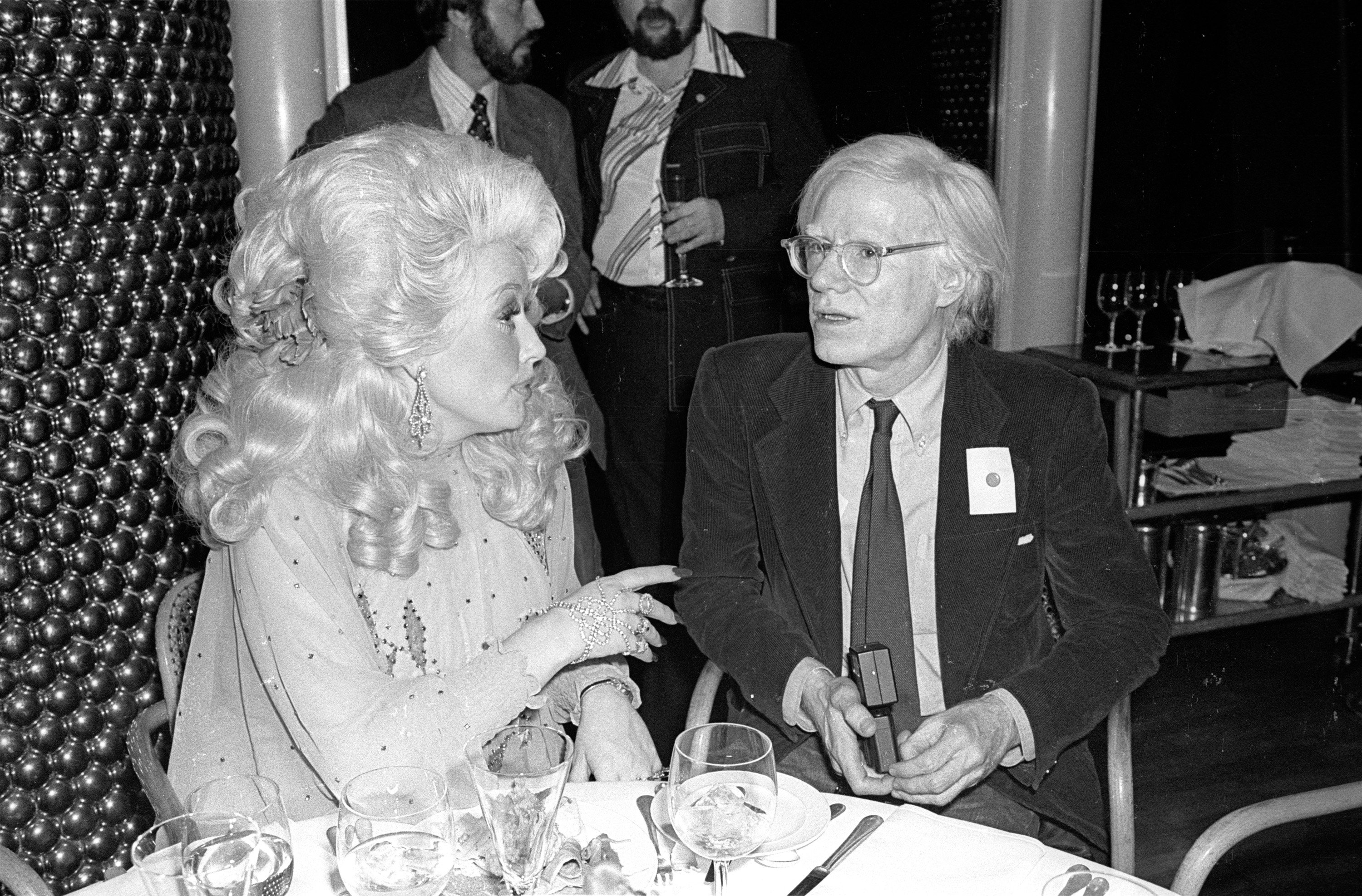 Dolly Parton dining with Andy Warhol at Windows On The World.