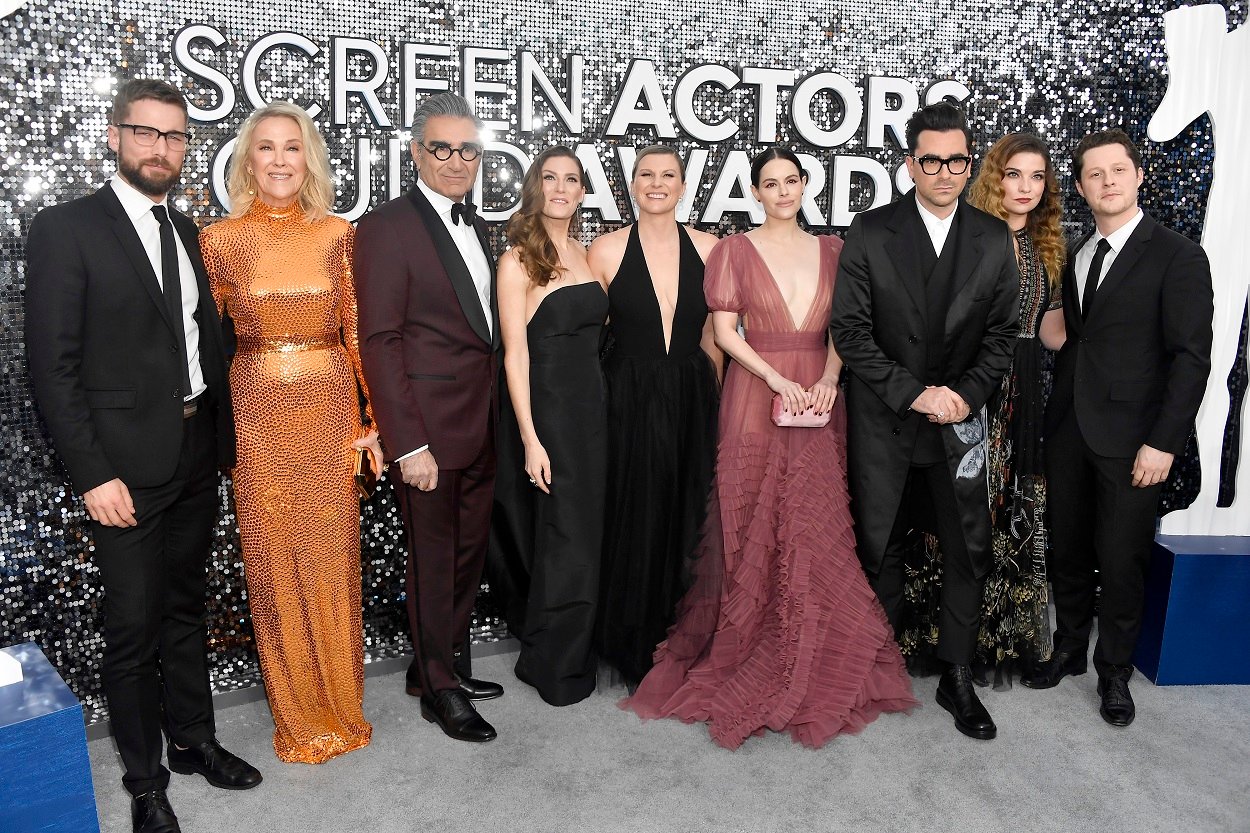 Schitt's Creek cast: Dustin Milligan, Catherine O'Hara, Eugene Levy, Sarah Levy, Jennifer Robertson, Emily Hampshire, Daniel Levy, Annie Murphy, and Noah Reid post for the SAG Awards