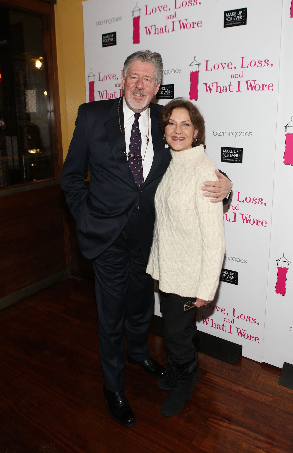 Edward Herrmann smiles as he puts his arm around his 'Gilmore Girls co-star, Kelly Bishop, at the 500th performance of 'Love, Loss, and What I Wore'