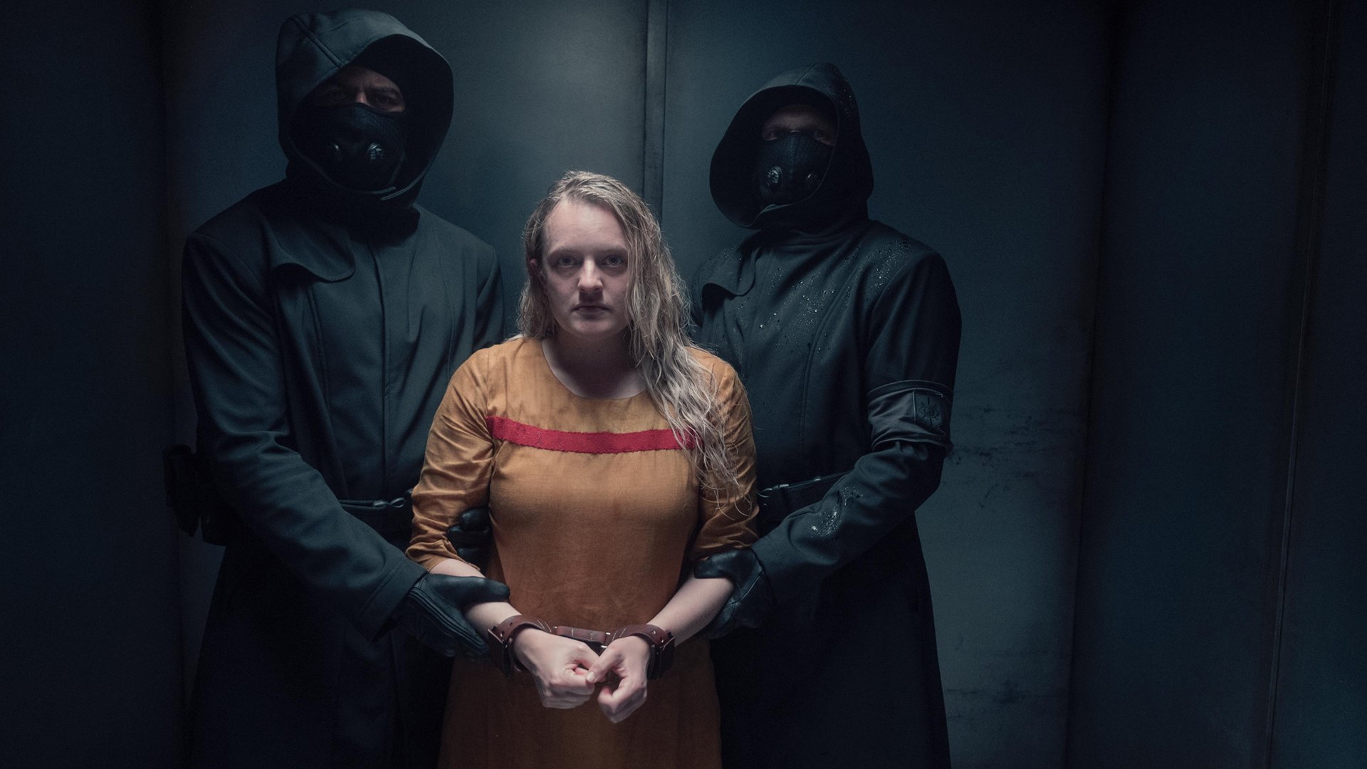 Elisabeth Moss as June Osborne held captive by Gilead guards in ‘The Handmaid’s Tale’ Season 4 Episode 3