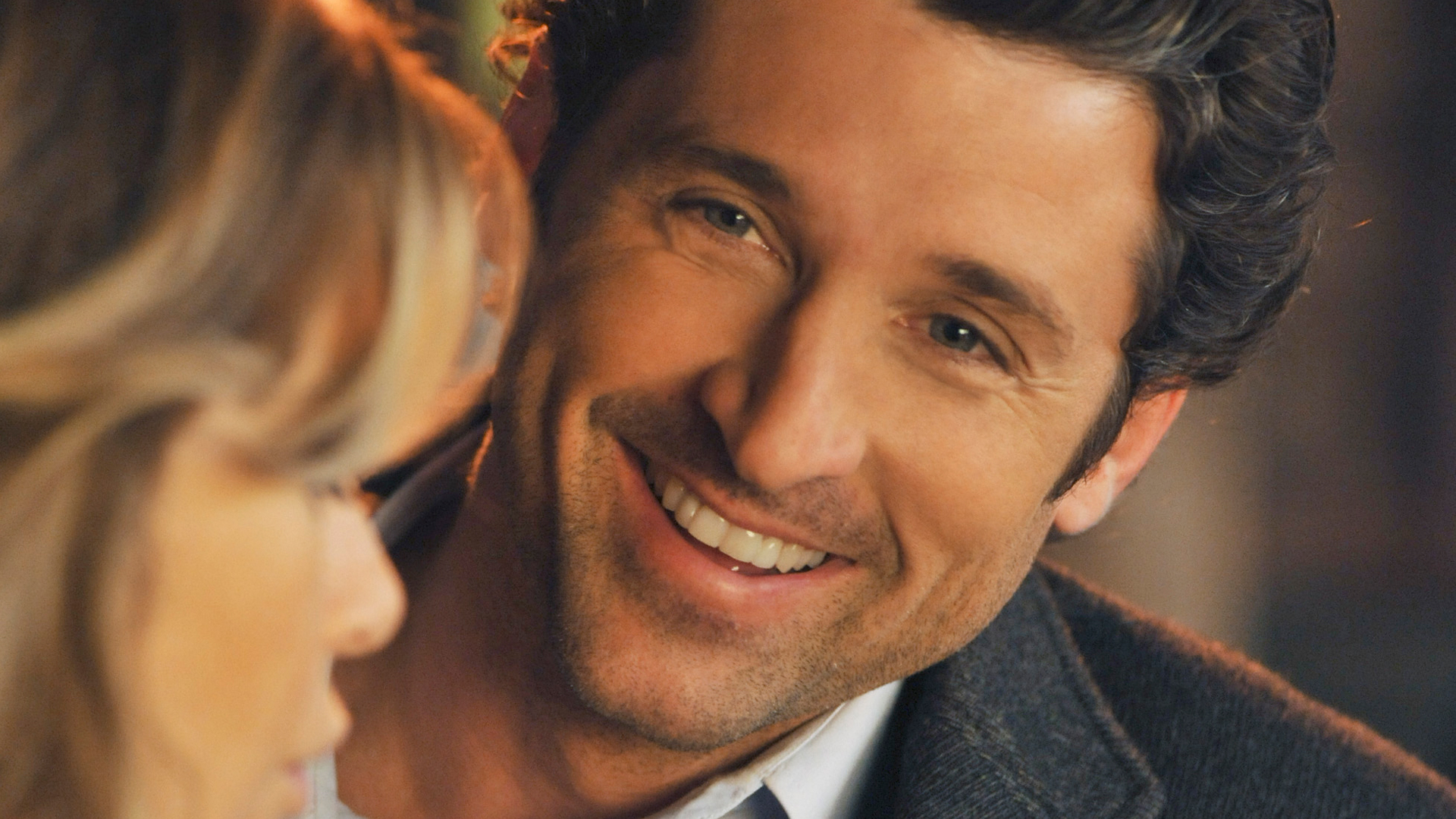 Patrick Dempsey as Derek ‘McDreamy’ Shepherd smiling at Ellen Pompeo as Meredith Grey in ‘Grey’s Anatomy,’ ‘There’s No I in Team’