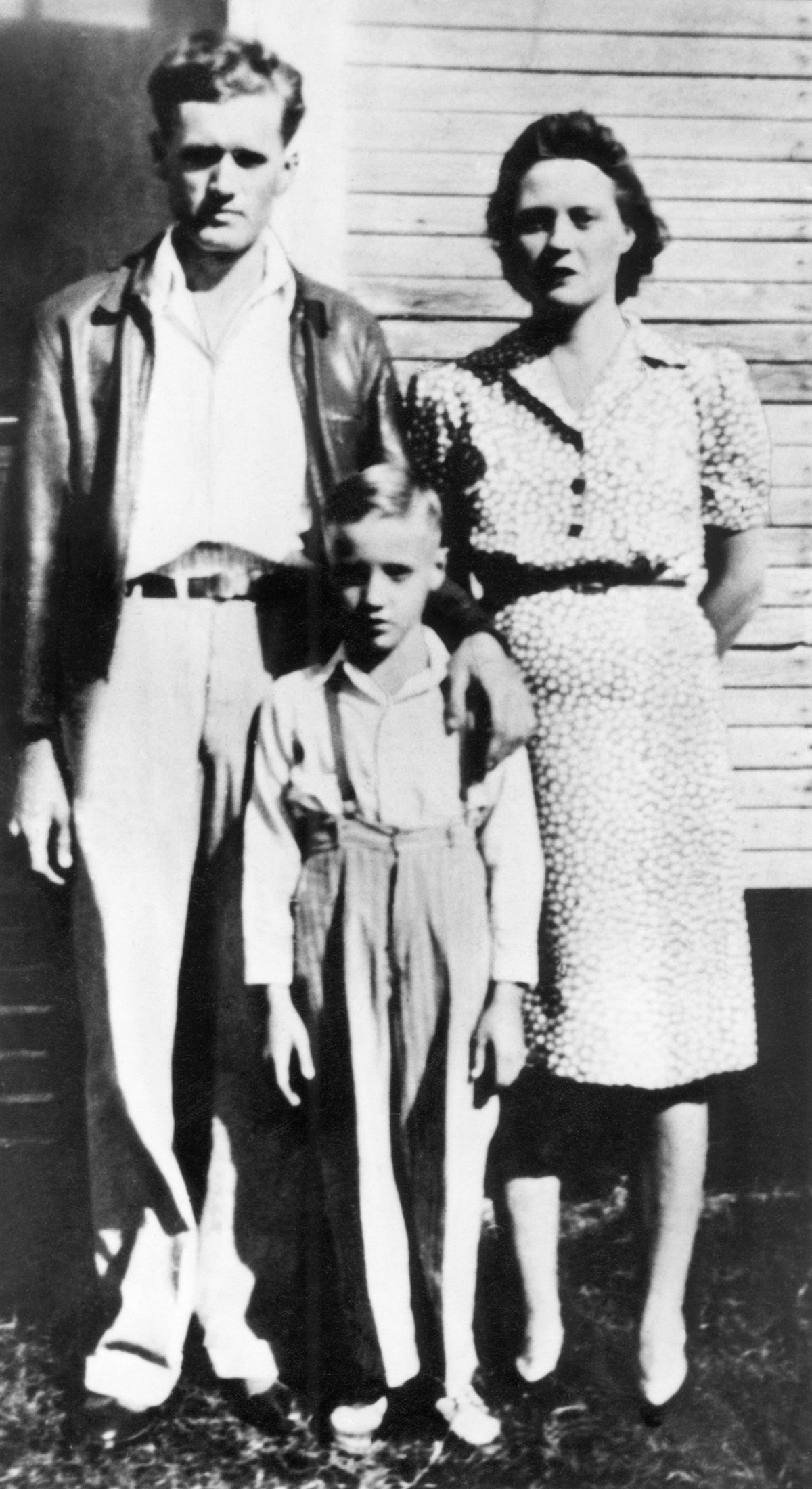 Elvis Presley as a child with his parents, Vernon Presley and Gladys Presley
