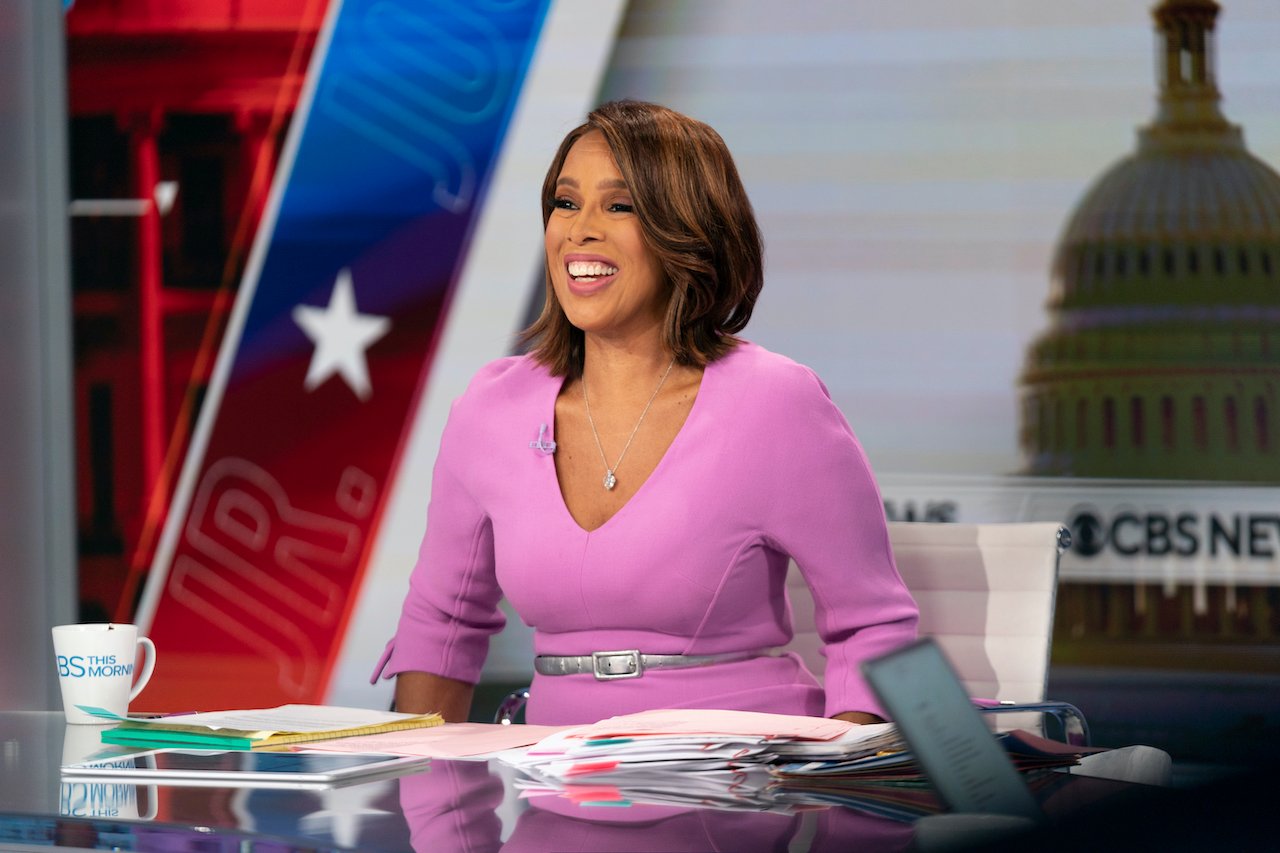 'CBS This Morning' co-host Gayle King smiling in a pink dress at the news desk and broadcasts live from Washington, D.C. 