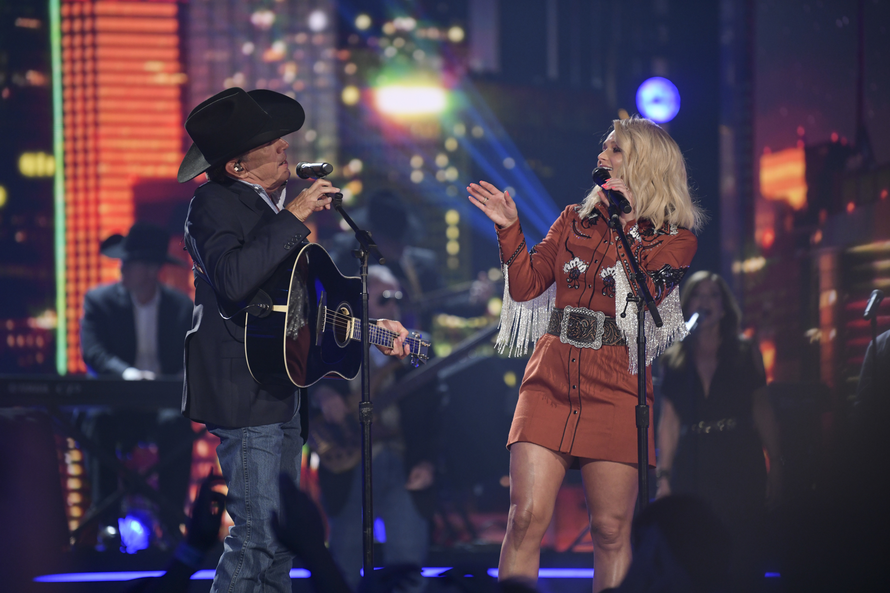 George Strait and Miranda Lambert performing together onstage at the 54th Academy of Country Music Awards ceremony