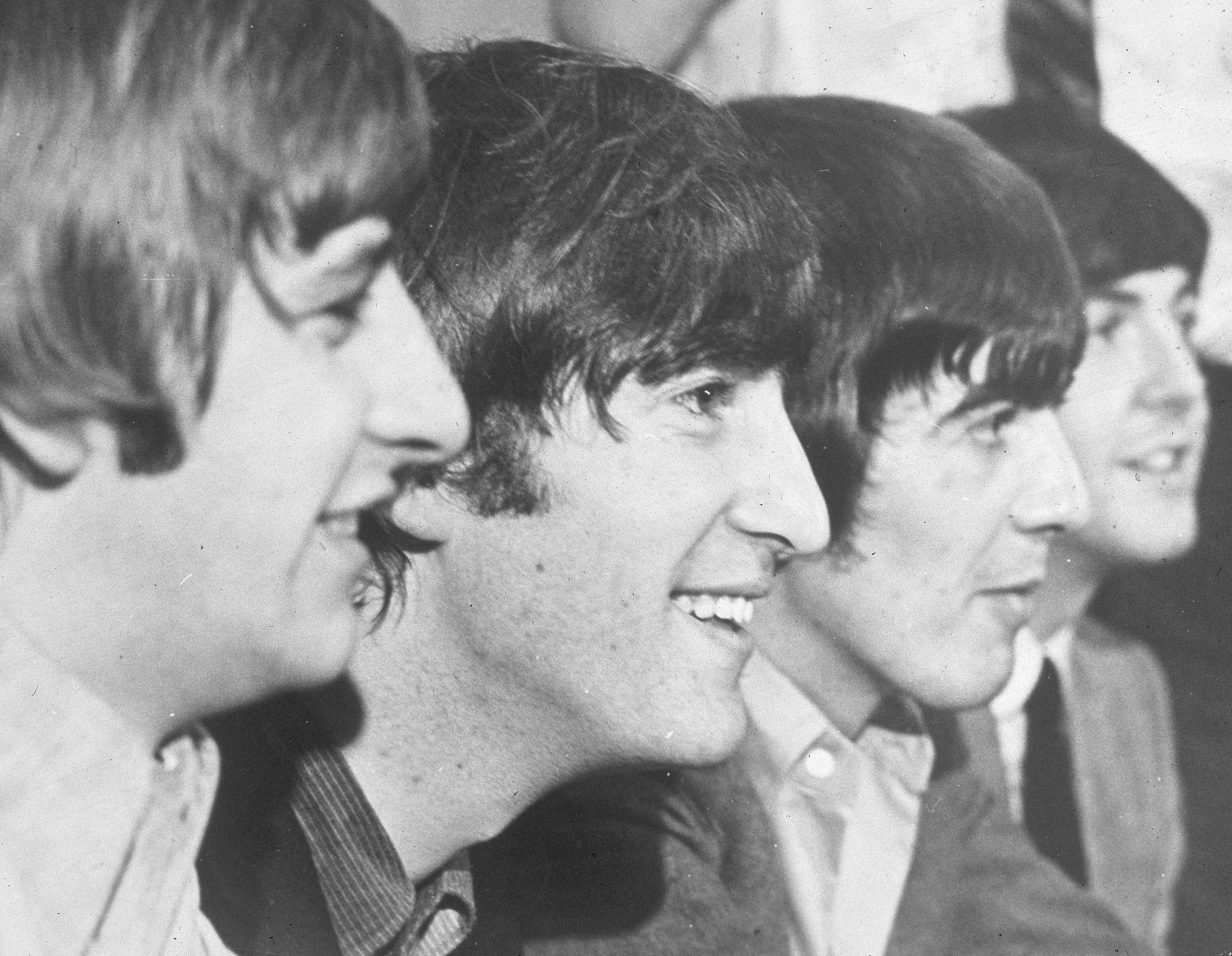 The members of English musical group The Beatles smile for the camera, (L to R): Ringo Starr, John Lennon, George Harrison, and Paul McCartney, 1966