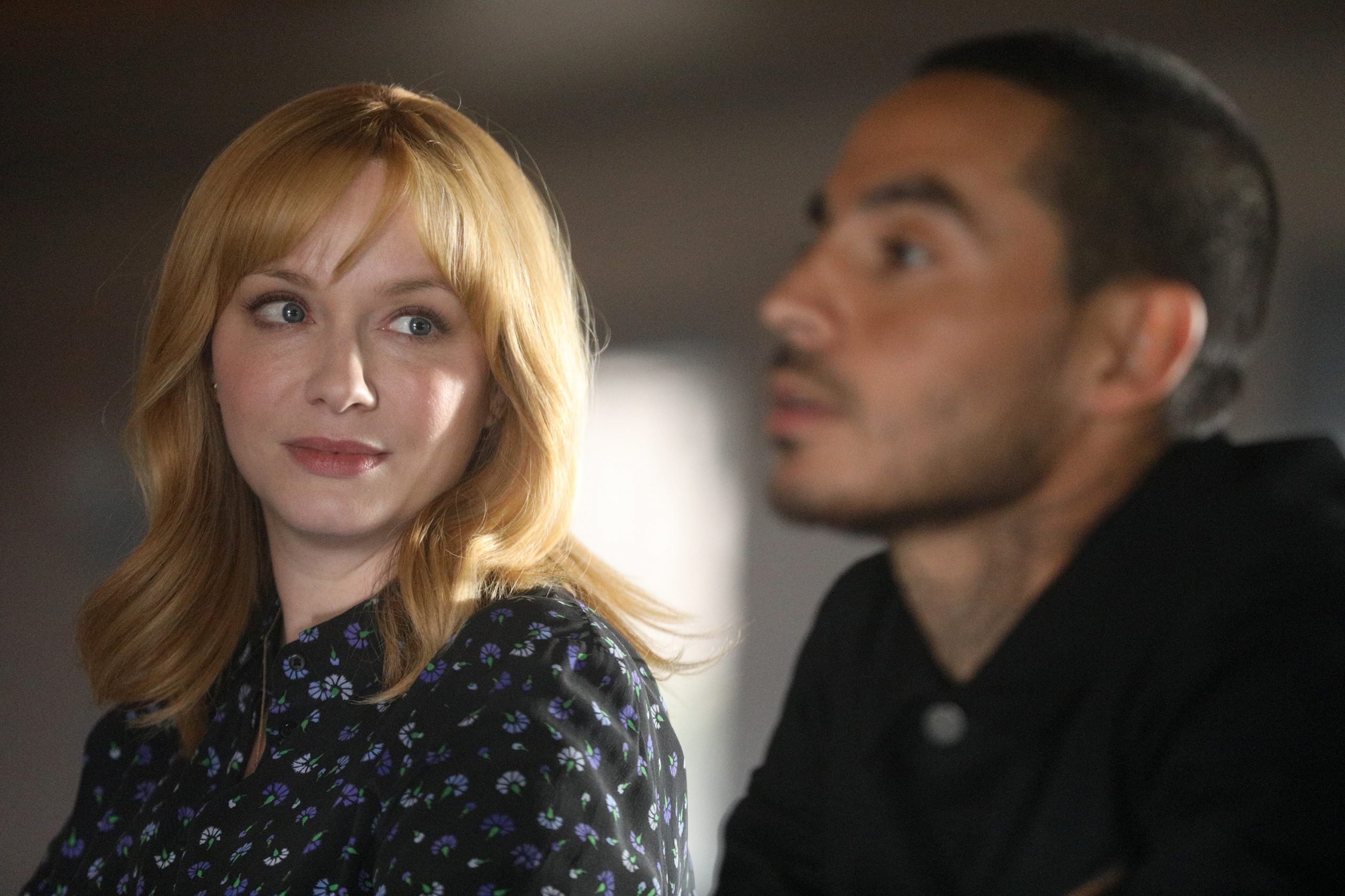 Christina Hendricks and Manny Montana filming a scene from 'Good Girls' as Beth and Rio