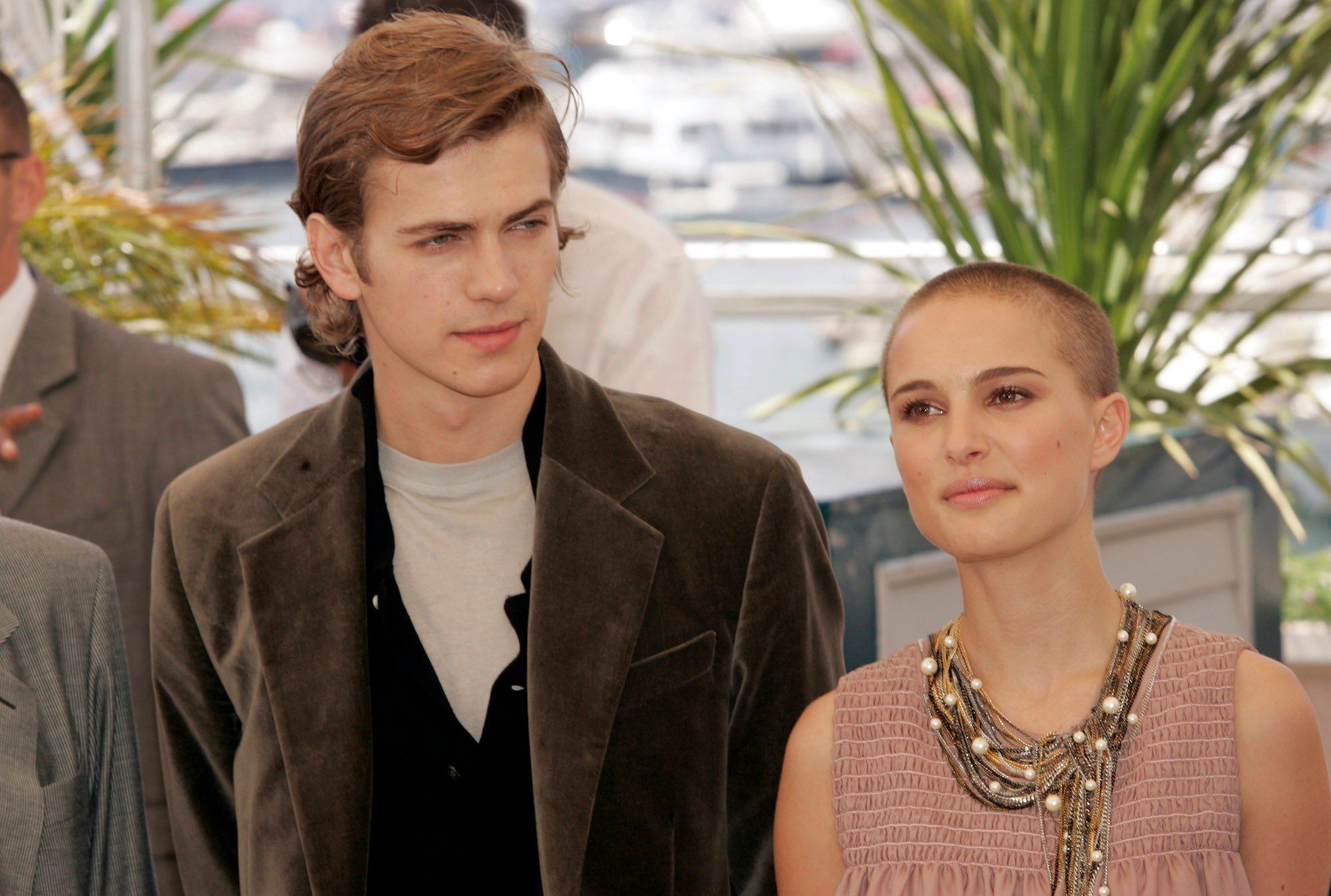 Hayden Christensen and Natalie Portman in front of a blurred background