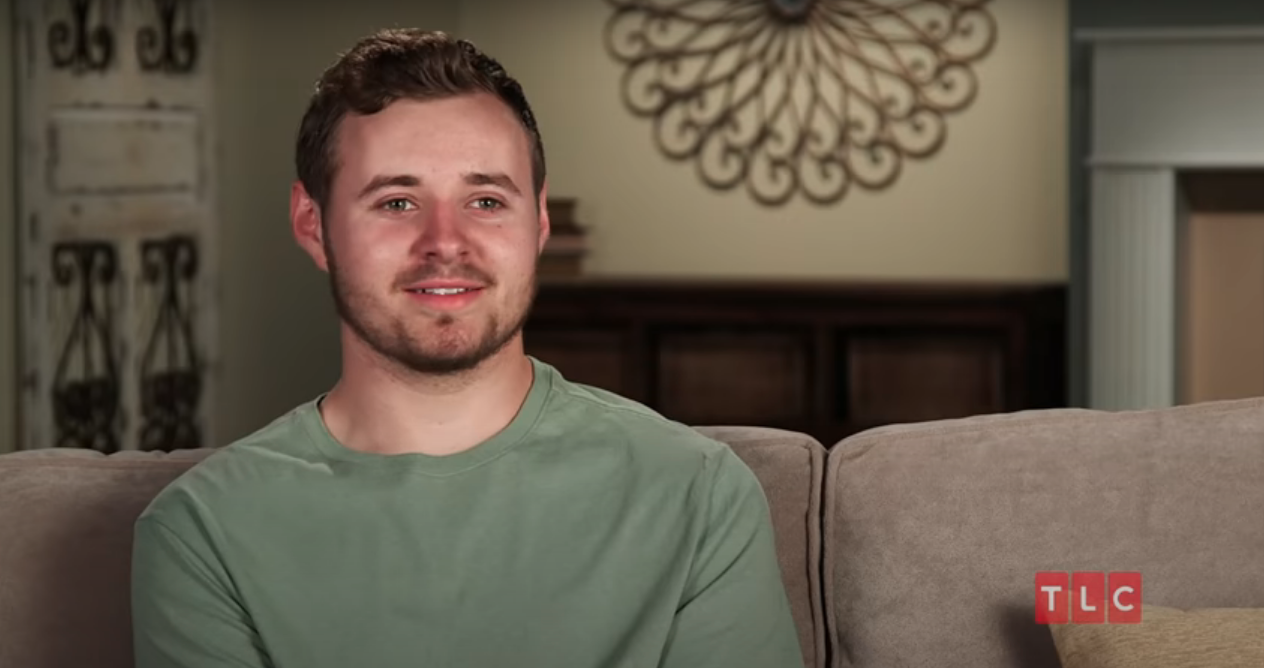 Jed Duggar sitting on a couch in episode of Counting on