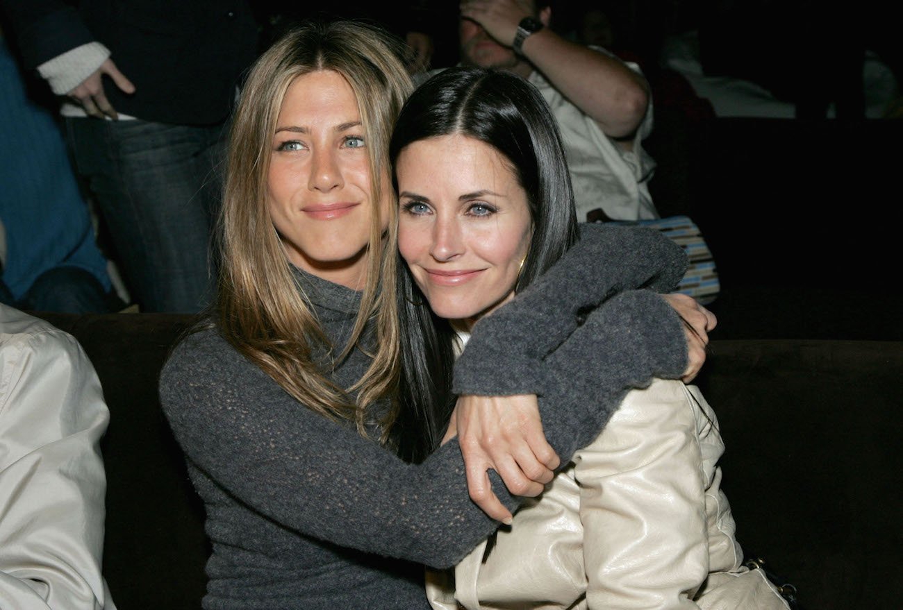 Jennifer Aniston hugging Courteney Cox