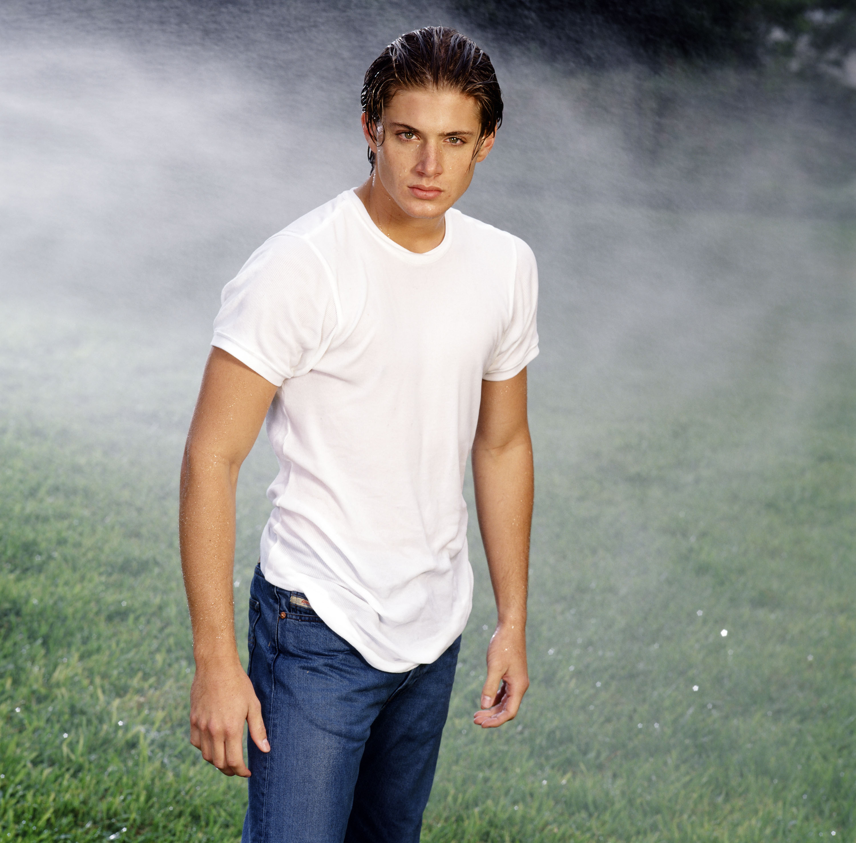 Jensen Ackles standing in sprinklers on Days of Our Lives