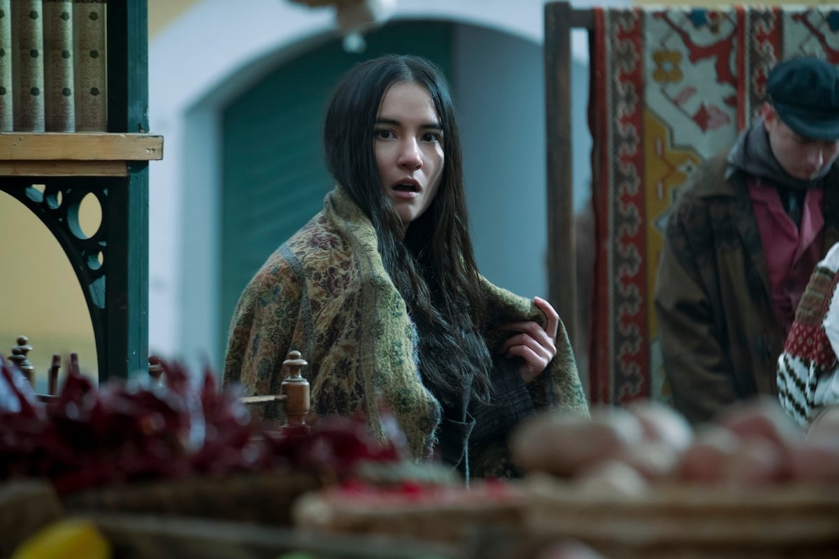 Jessie Mei Li looking shocked as Alina Starkov in 'Shadow and Bone'