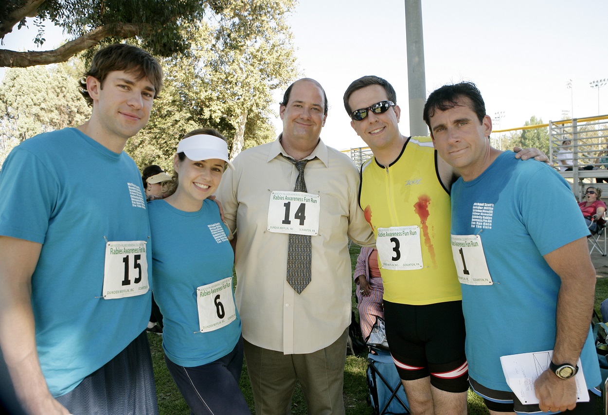 The Office cast: John Krasinski, Jenna Fischer, Brian Baumgartner, Ed Helms, and Steve Carell pose after filming an episode