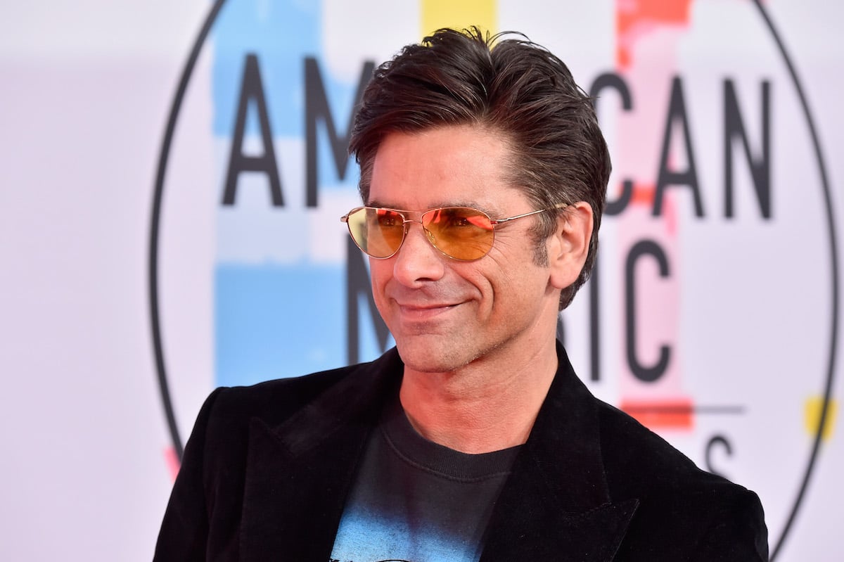 John Stamos  wears sunglasses at the American Music Awards 