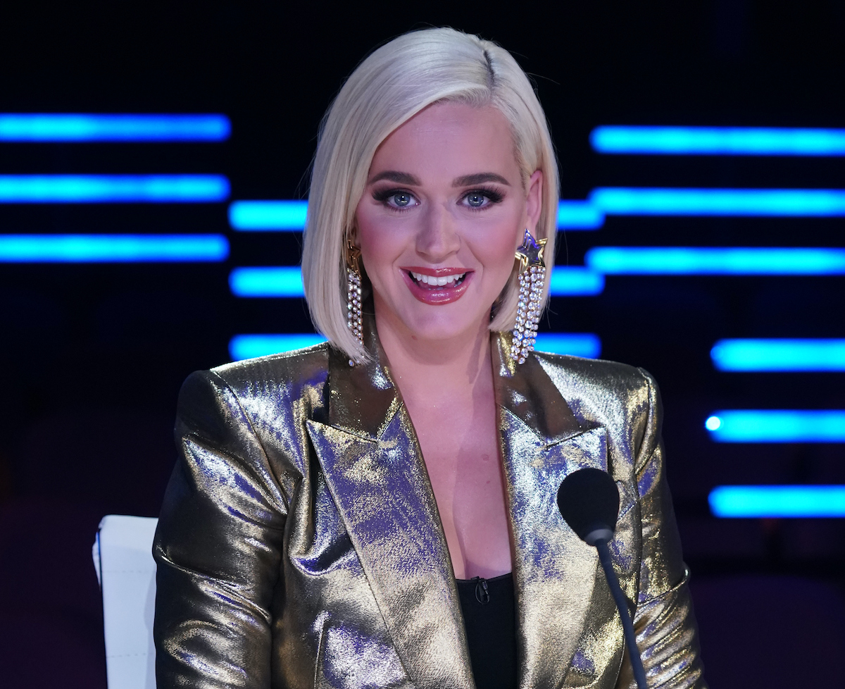 Katy Perry in a gold suit jacket, black top, and platinum blonde hair on 'American Idol' on ABC