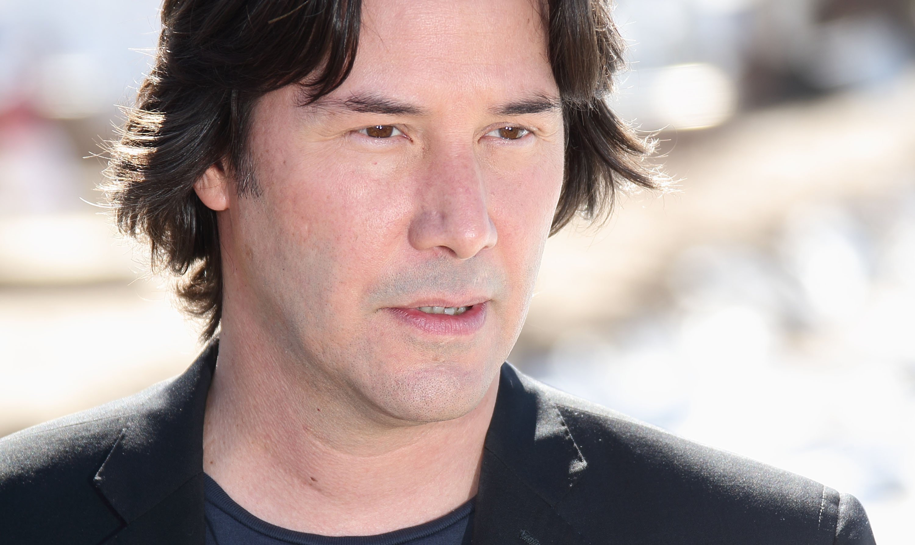 Keanu Reeves clean shaven at the Cannees Film Festival