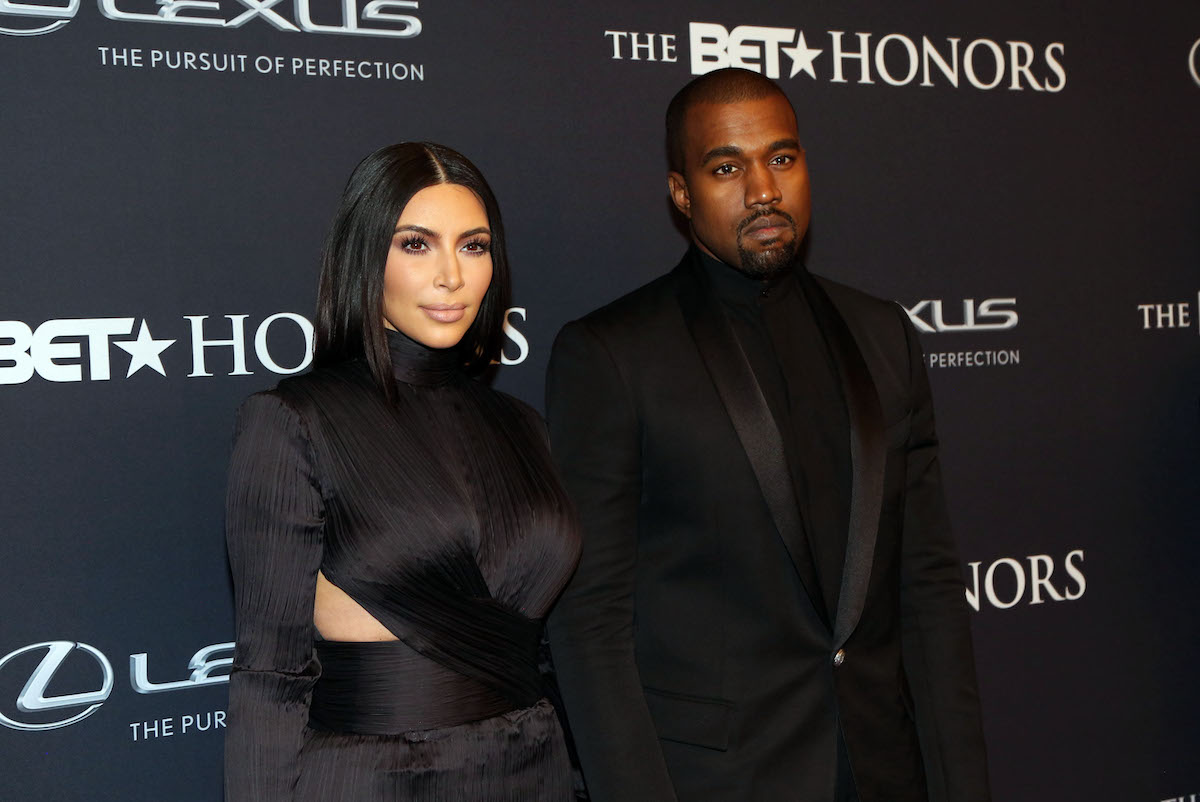 Kim Kardashian and Kanye West dressed in all black