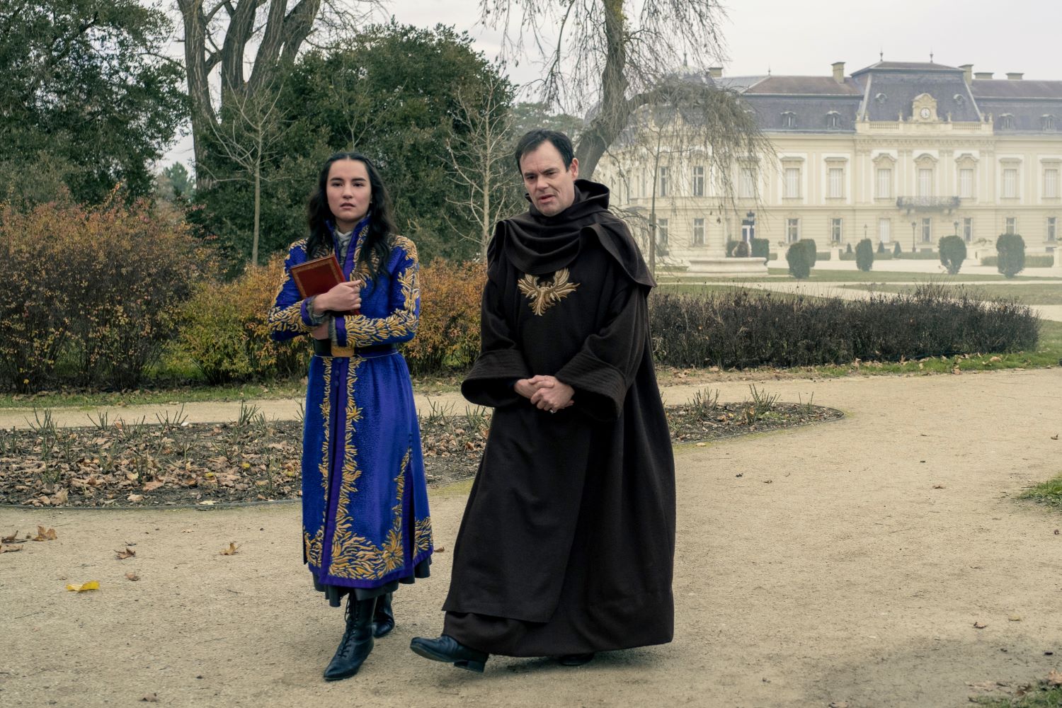 L-R JESSIE MEI LI as ALINA STARKOV and KEVIN ELDON as THE APPARAT in SHADOW AND BONE