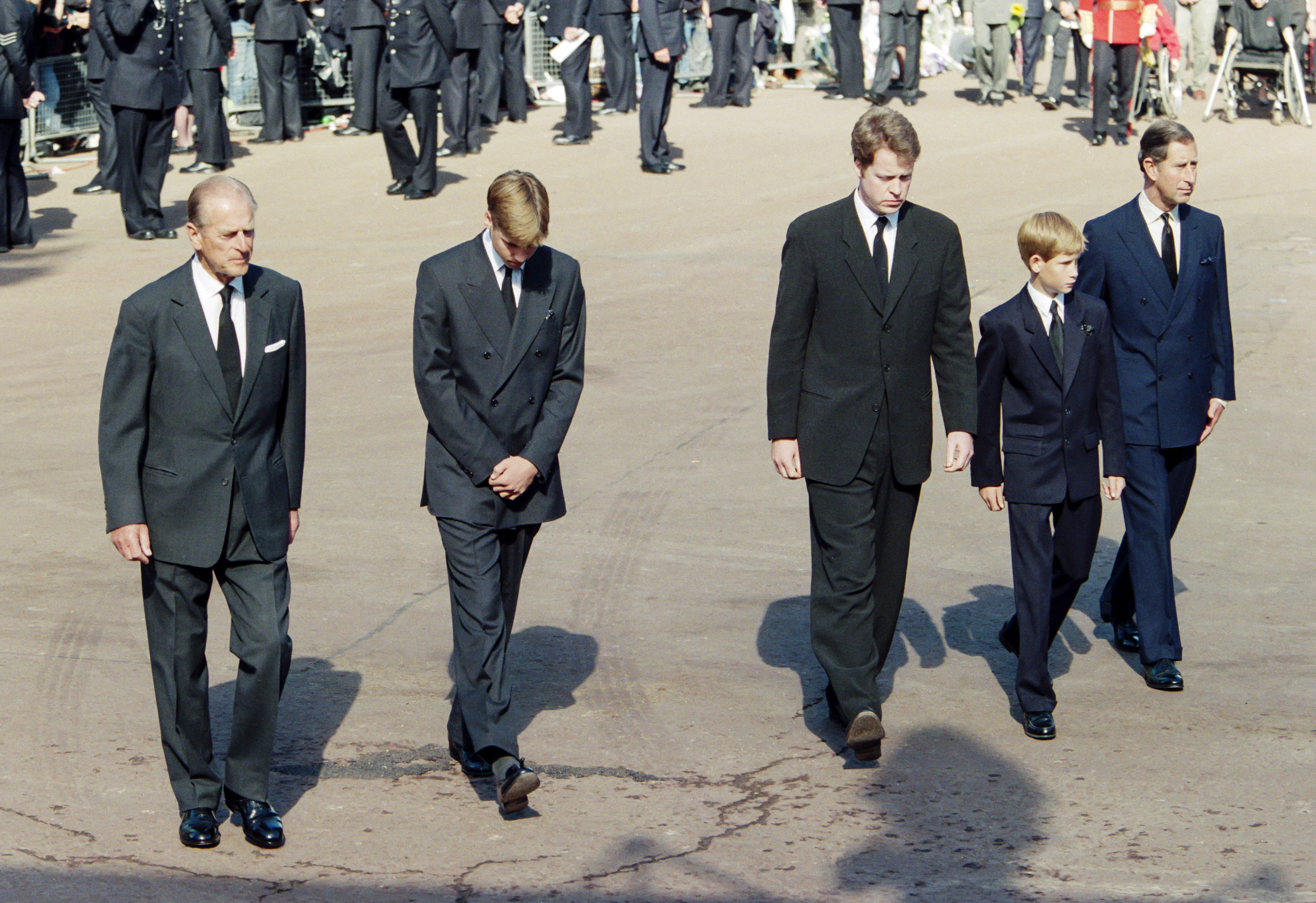 (L-R): Prince Philip, Prince William, Earl Spencer, Prince Harry, and Charles joining in Princess Diana's funeral procession