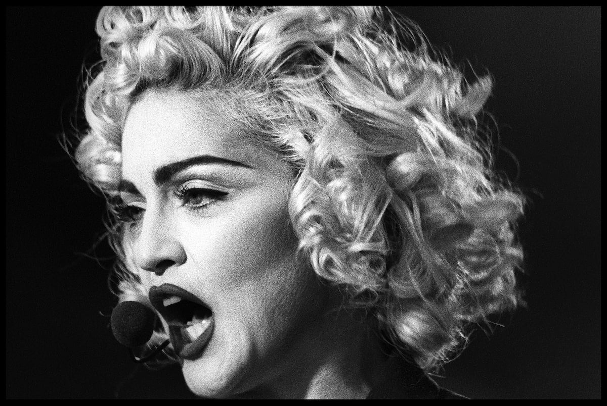 black and white close up photo of Madonna performing during the Blond Ambition tour