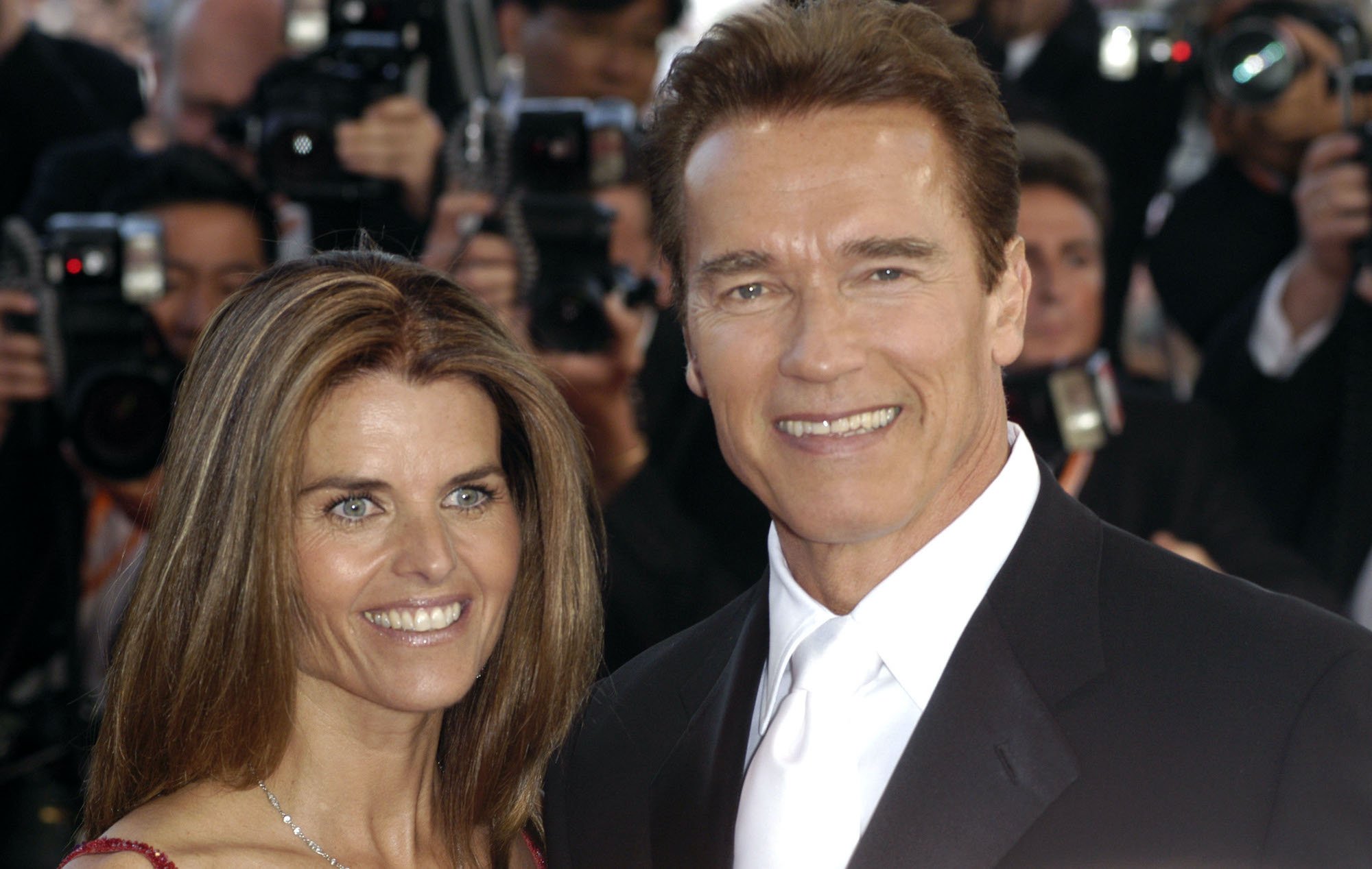 Maria Shriver and Arnold Schwarzenegger smiling