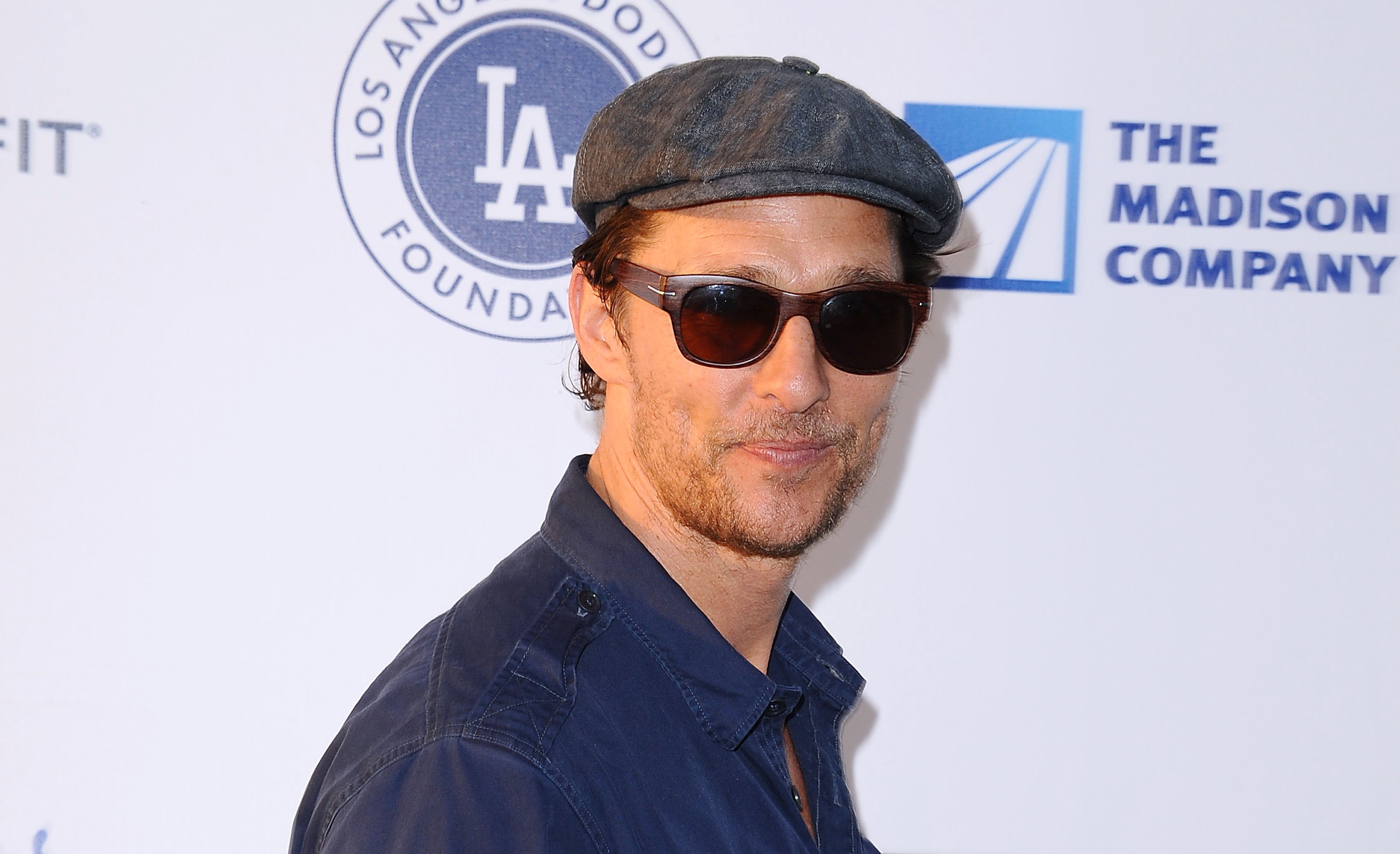Matthew McConaughey wearing sunglasses and a beret