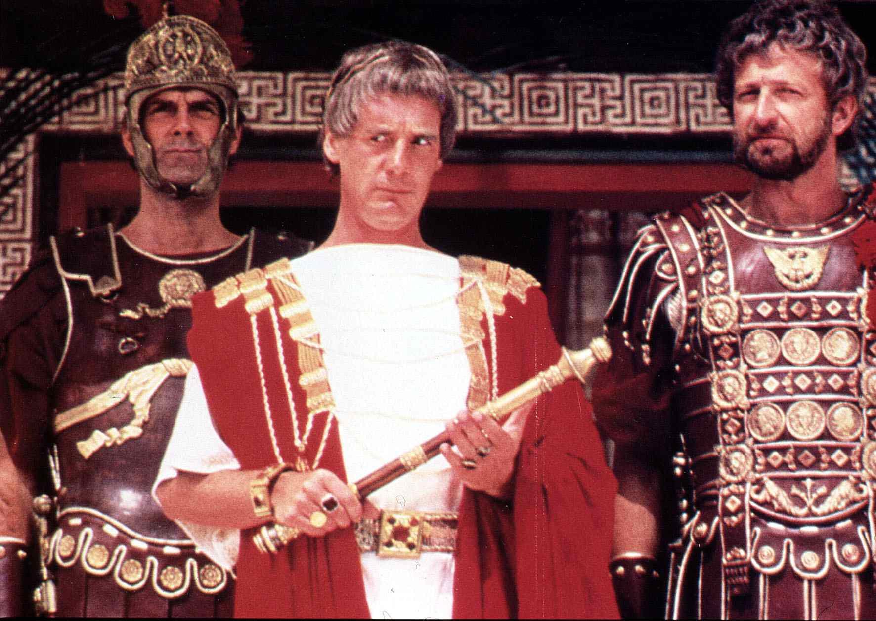 Three characters in Roman attire in a scene from Life of Brian