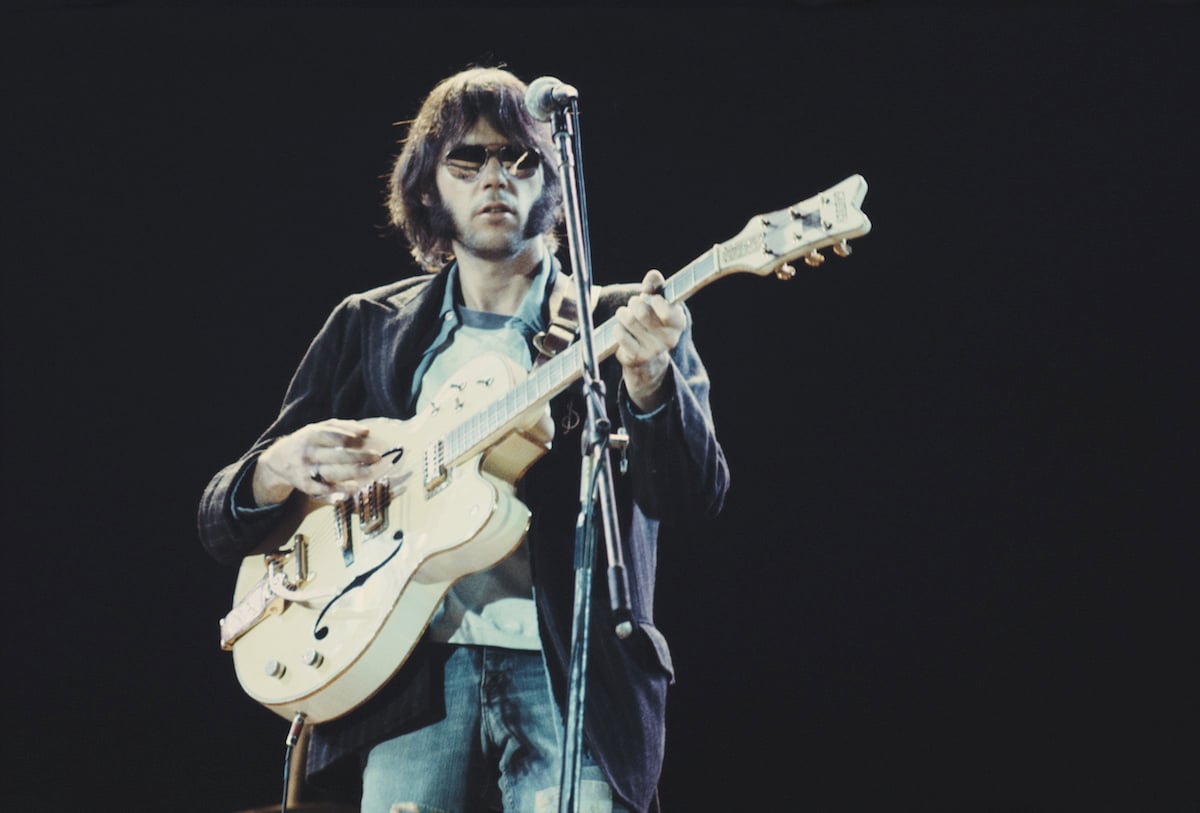Canadian musician Neil Young of Crosby, Stills, Nash And Young performs on stage at Wembley Stadium, London on September 14th 1974.