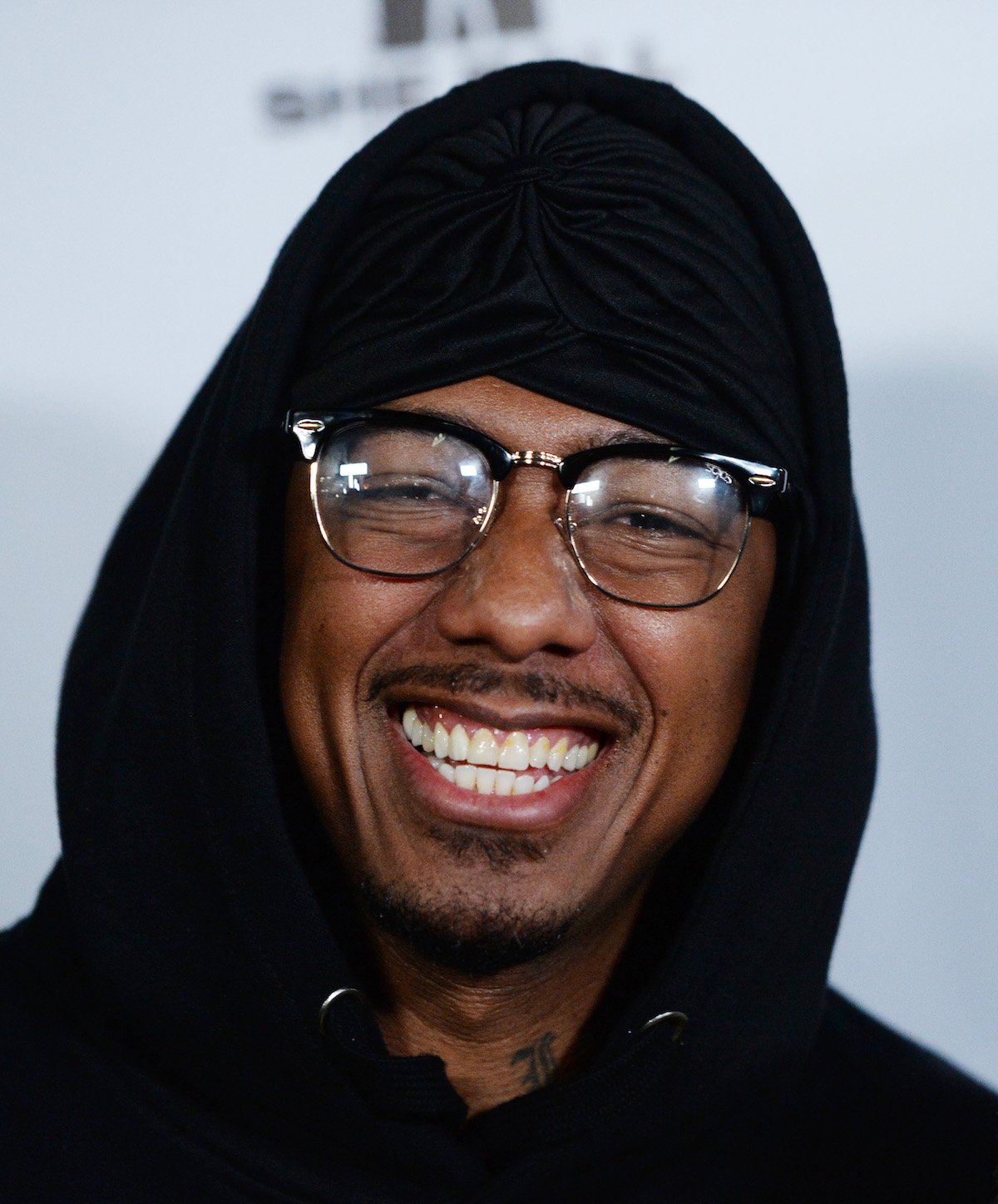 Nick Cannon smiles after announcing he's expecting two more kids