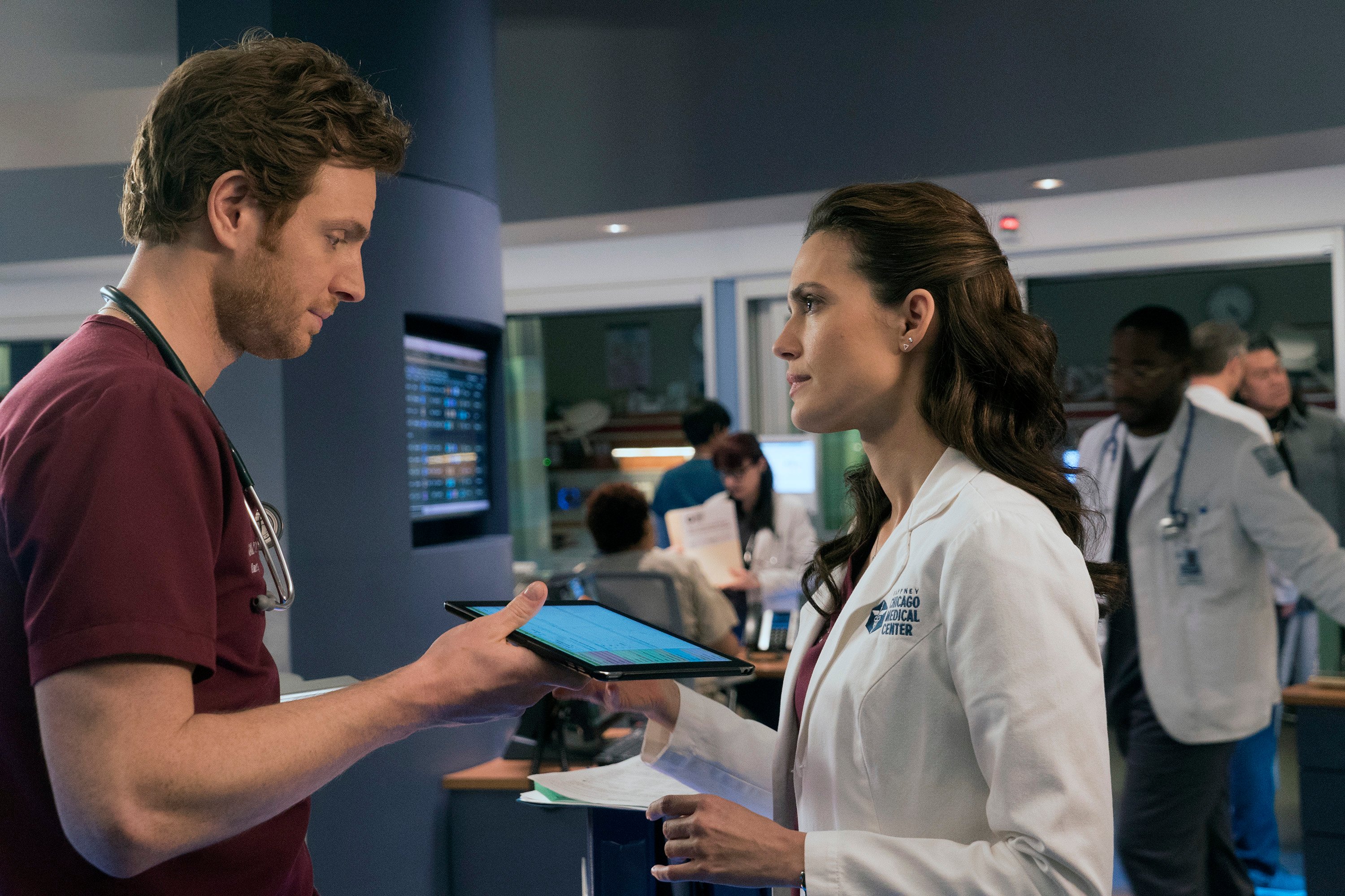 Nick Ghelfuss and Will Halstead and Torrey DeVitto as Natalie Manning