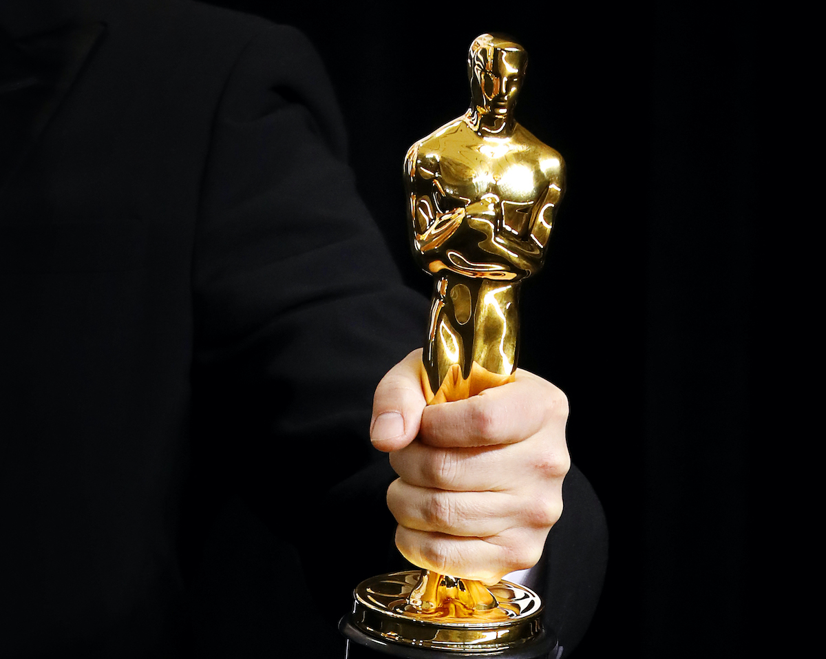 An Academy Award winner's hand holding an Oscar statue in the press room during the 90th Annual Academy Awards at Hollywood & Highland Center on March 4, 2018 in Hollywood, California