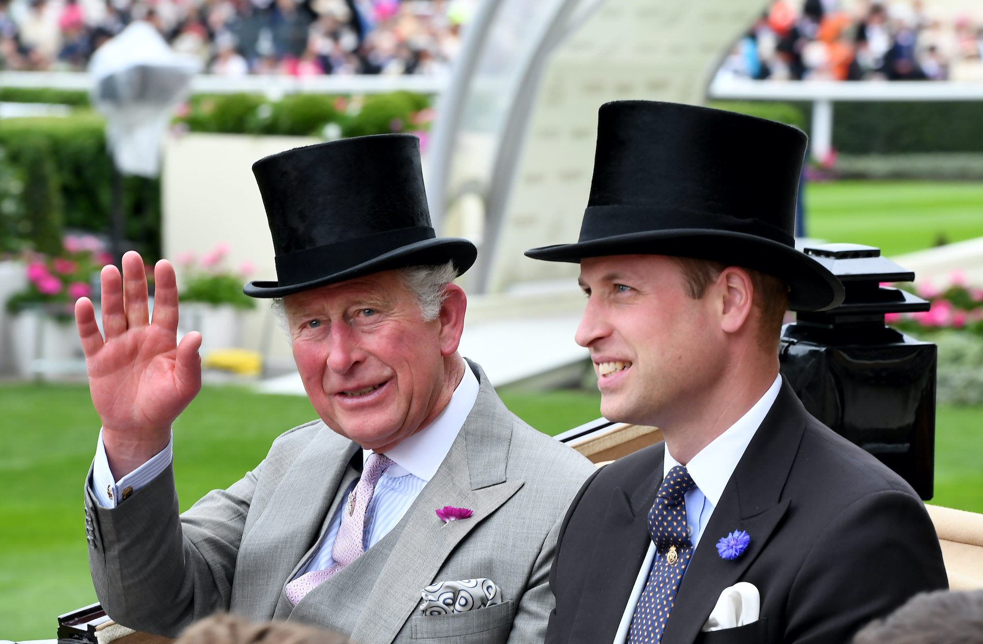 (L-R) Prince Charles waving and Prince William